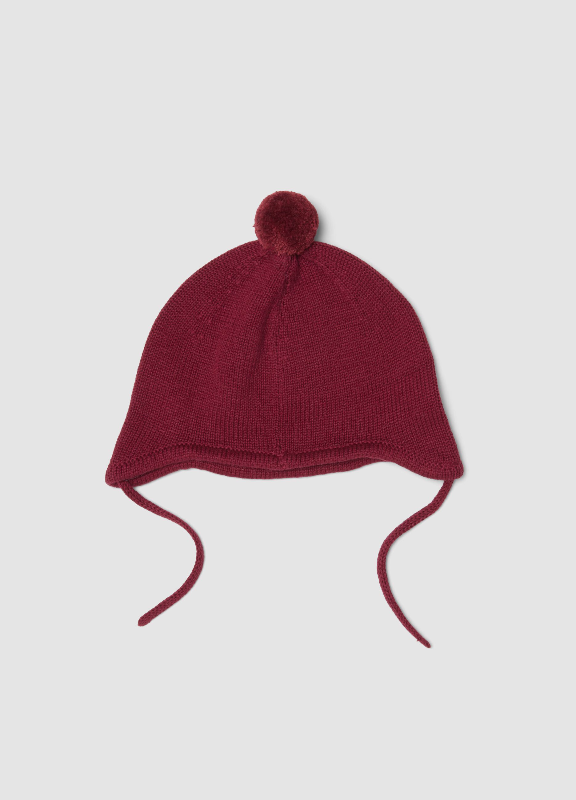 Cappello rosso in puro cotone organico con pon pon