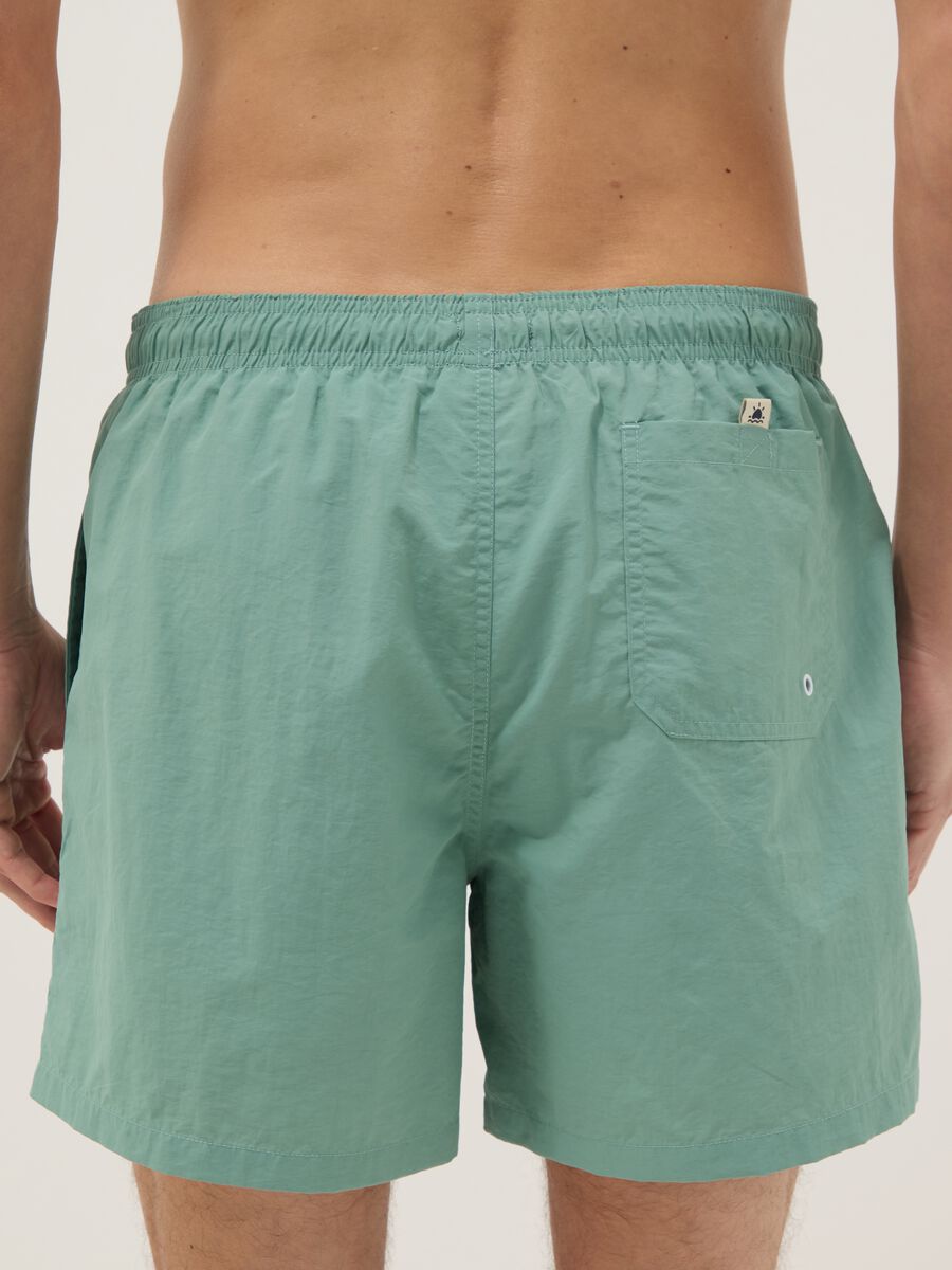 Green swim shorts with elasticated waistband_2