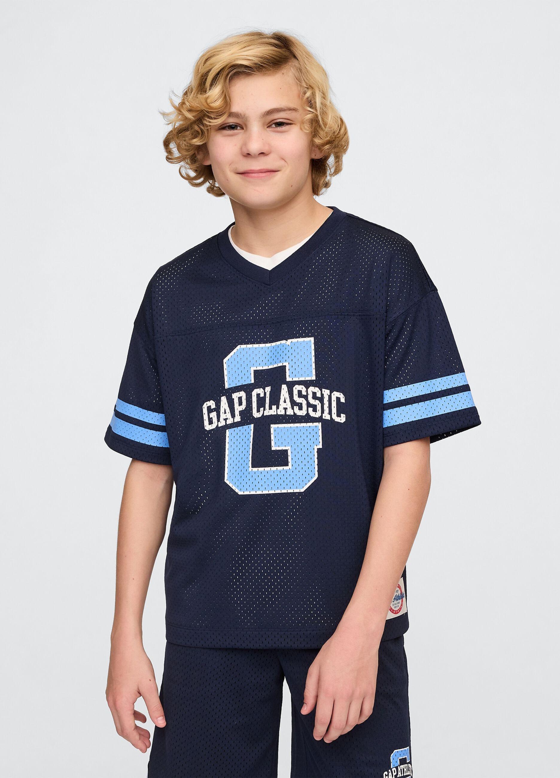 Blue sports jersey with logo and light blue accents