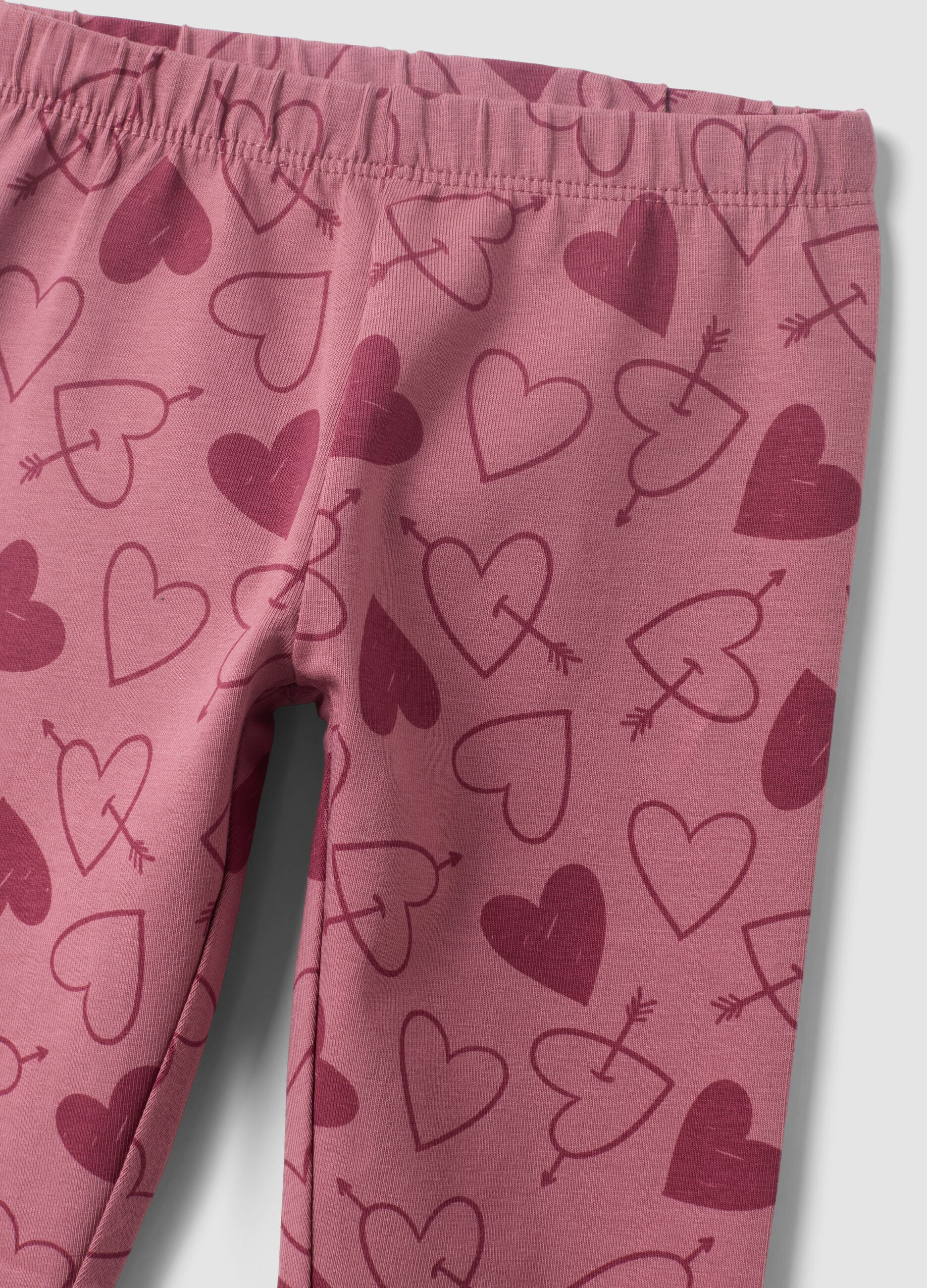 Leggings viola in misto cotone organico con fantasia animalier per bimba