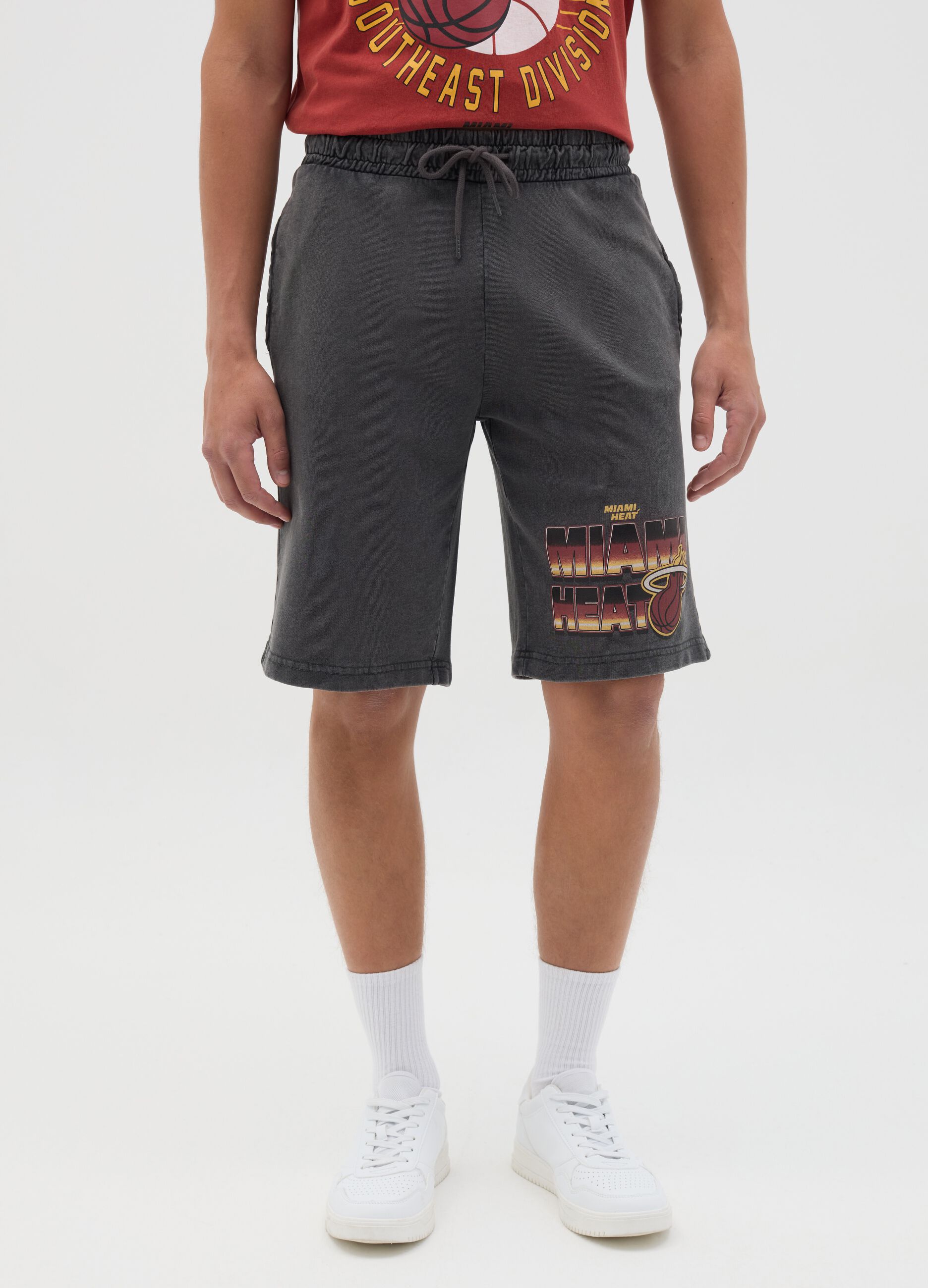 Grey sporty shorts with Miami Heat logo