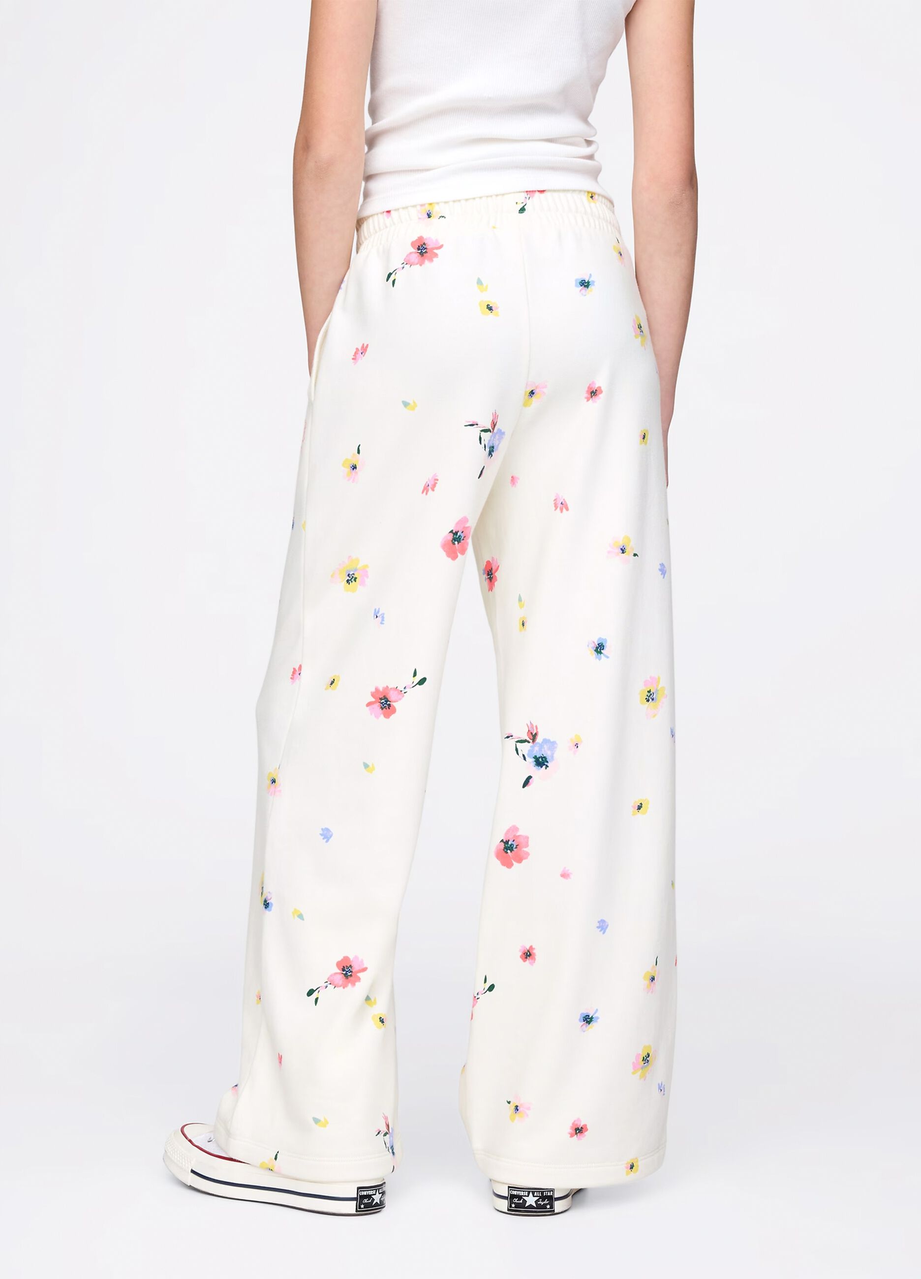 Joggers bianchi a gamba larga con stampa fiori