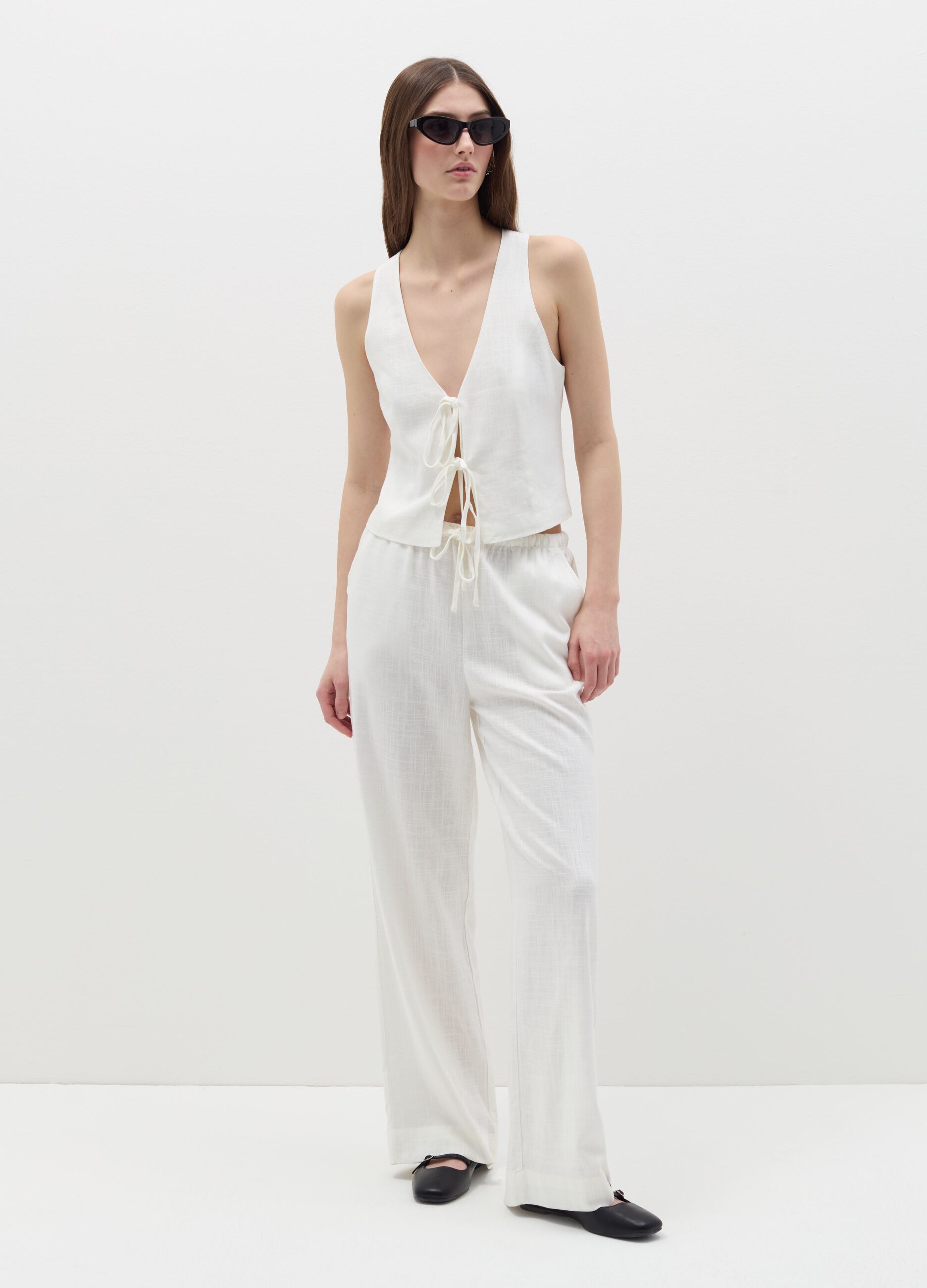 White linen gilet with laces