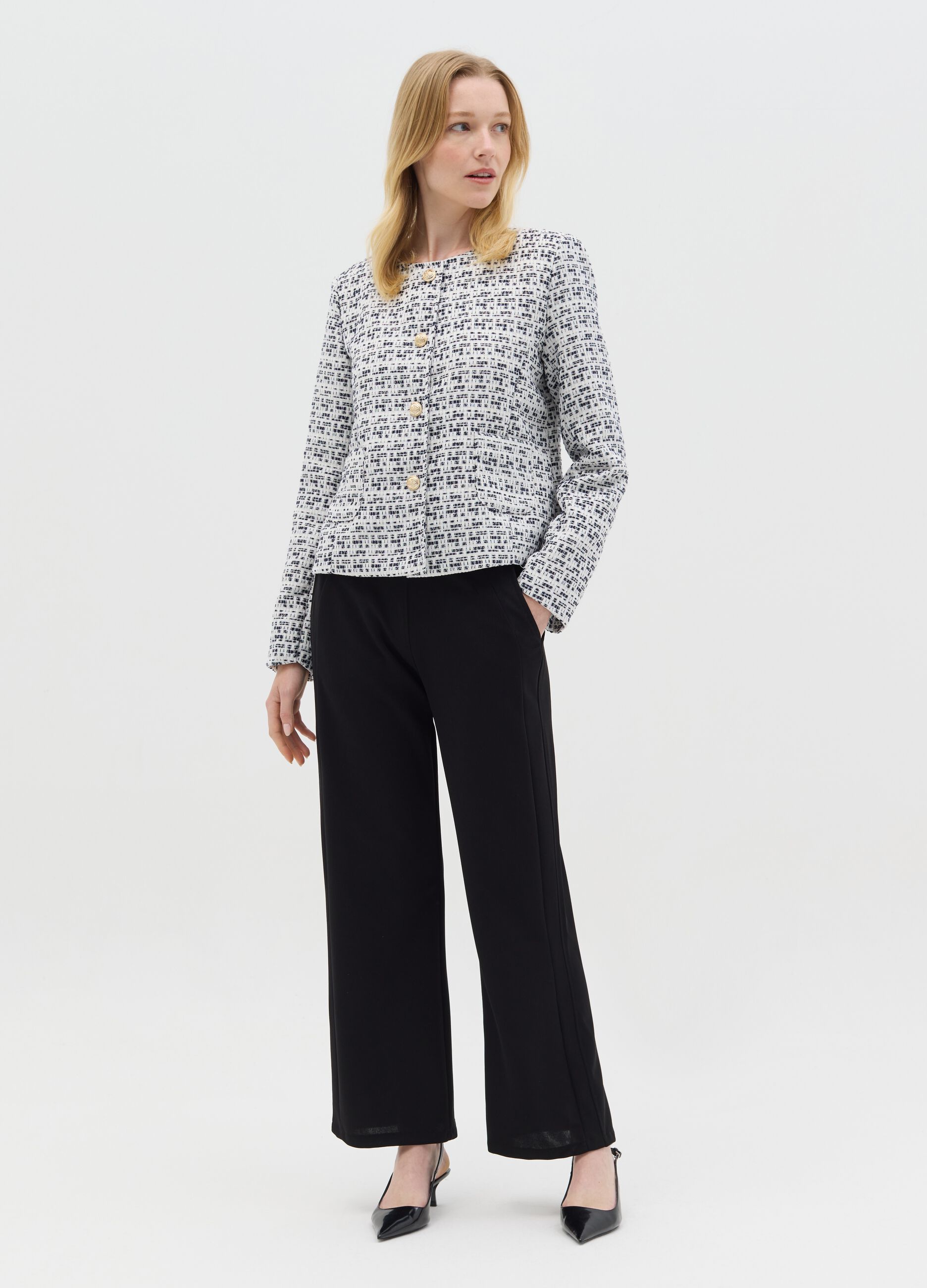 Short black and white jacket in tweed