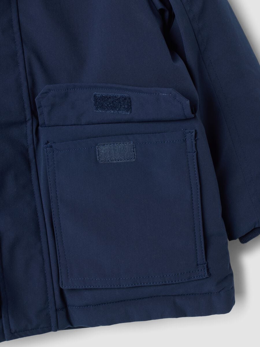 Long padded navy parka with detachable hood, oversized fit_3