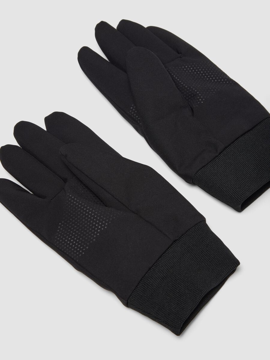 Black gloves with ribbed cuffs and non-slip grips_1