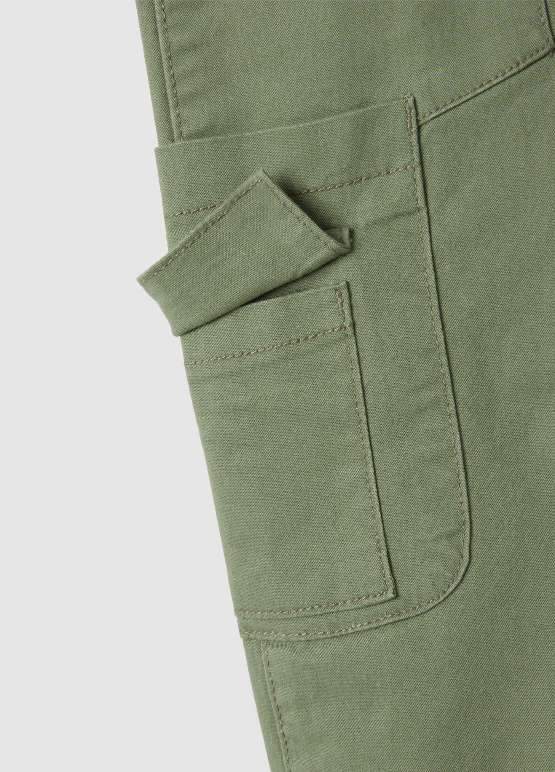 Children's elasticated green cotton trousers