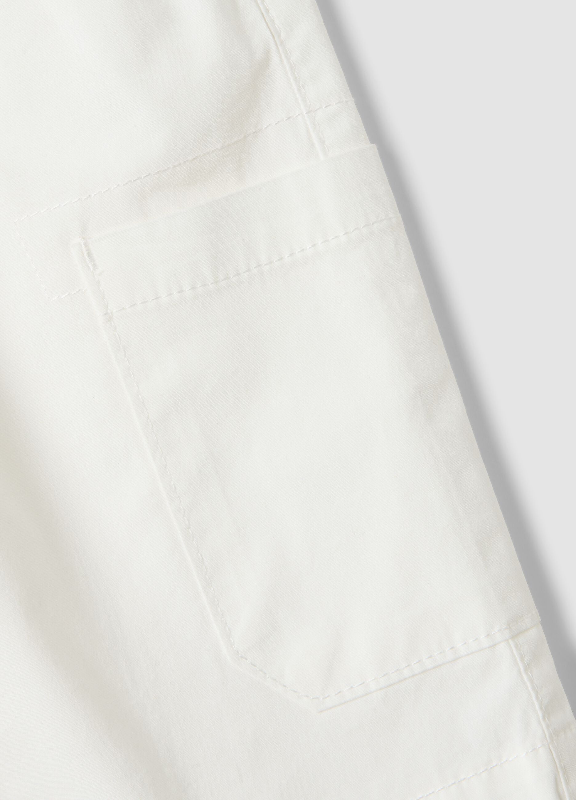 White stretch cotton shorts with elasticated waistband
