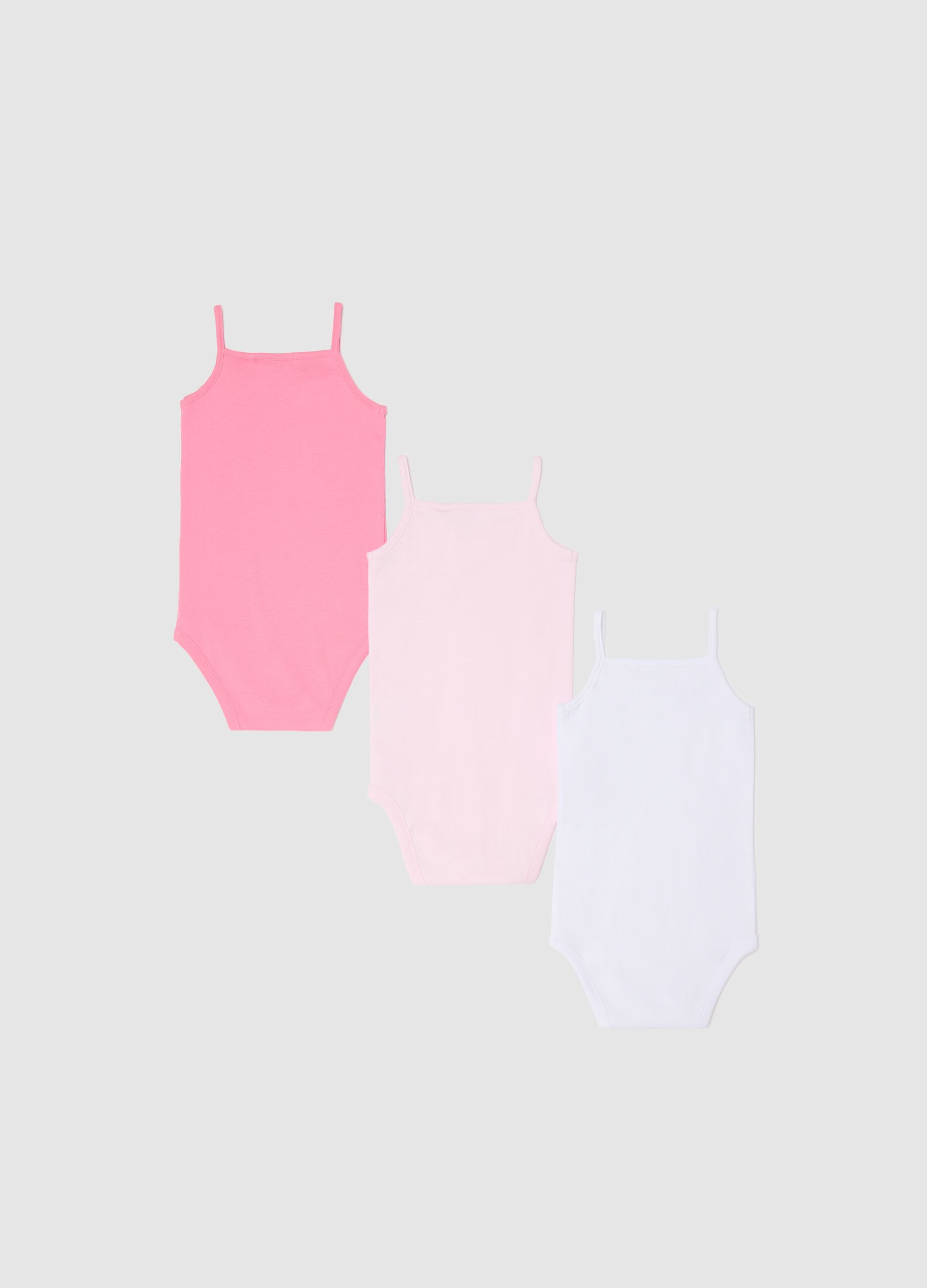 Three-pack white and pink bodysuits in organic cotton