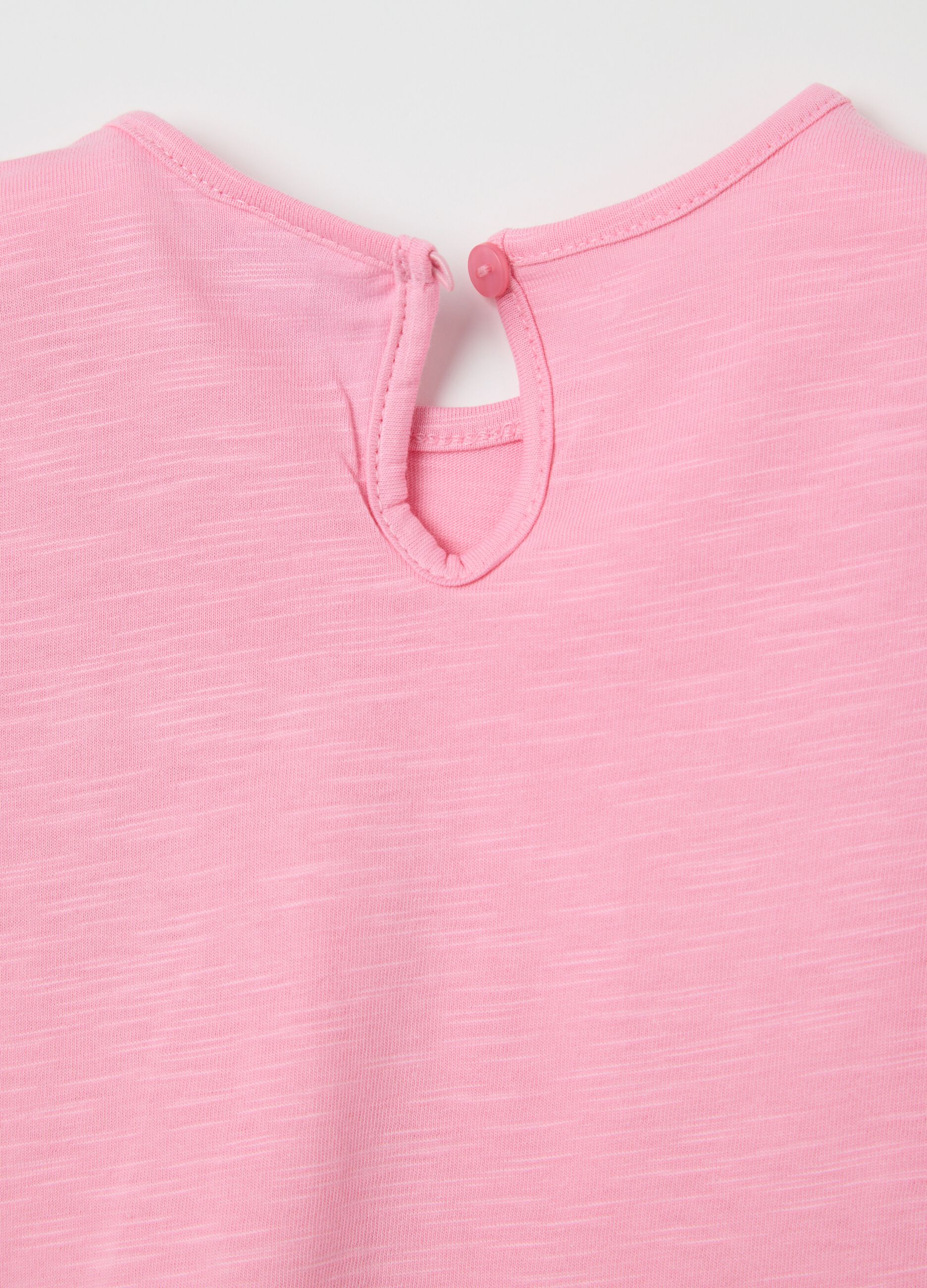 Pink cotton T-shirt with crochet flowers