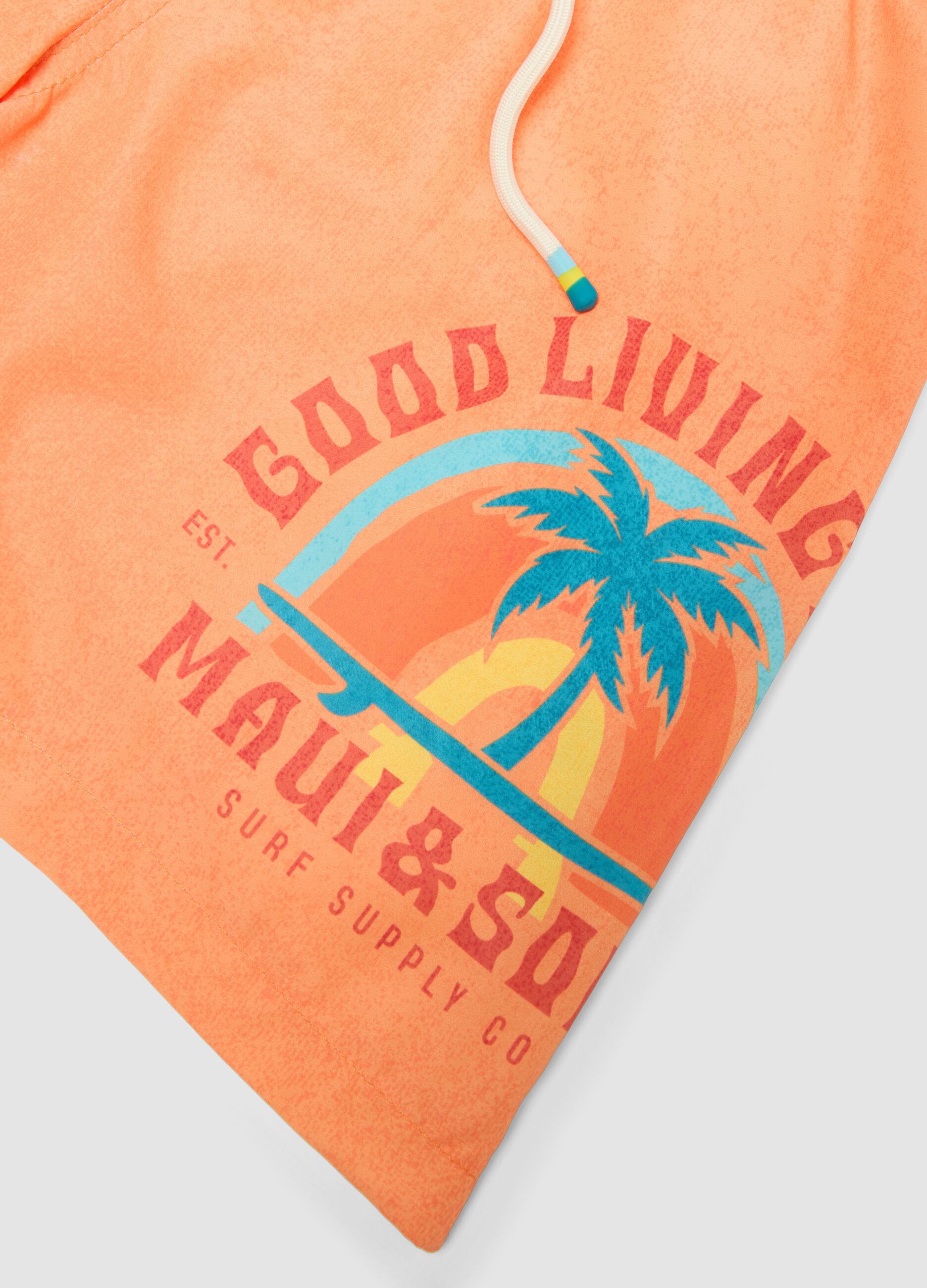 Orange boys&rsquo; swim shorts with tropical print