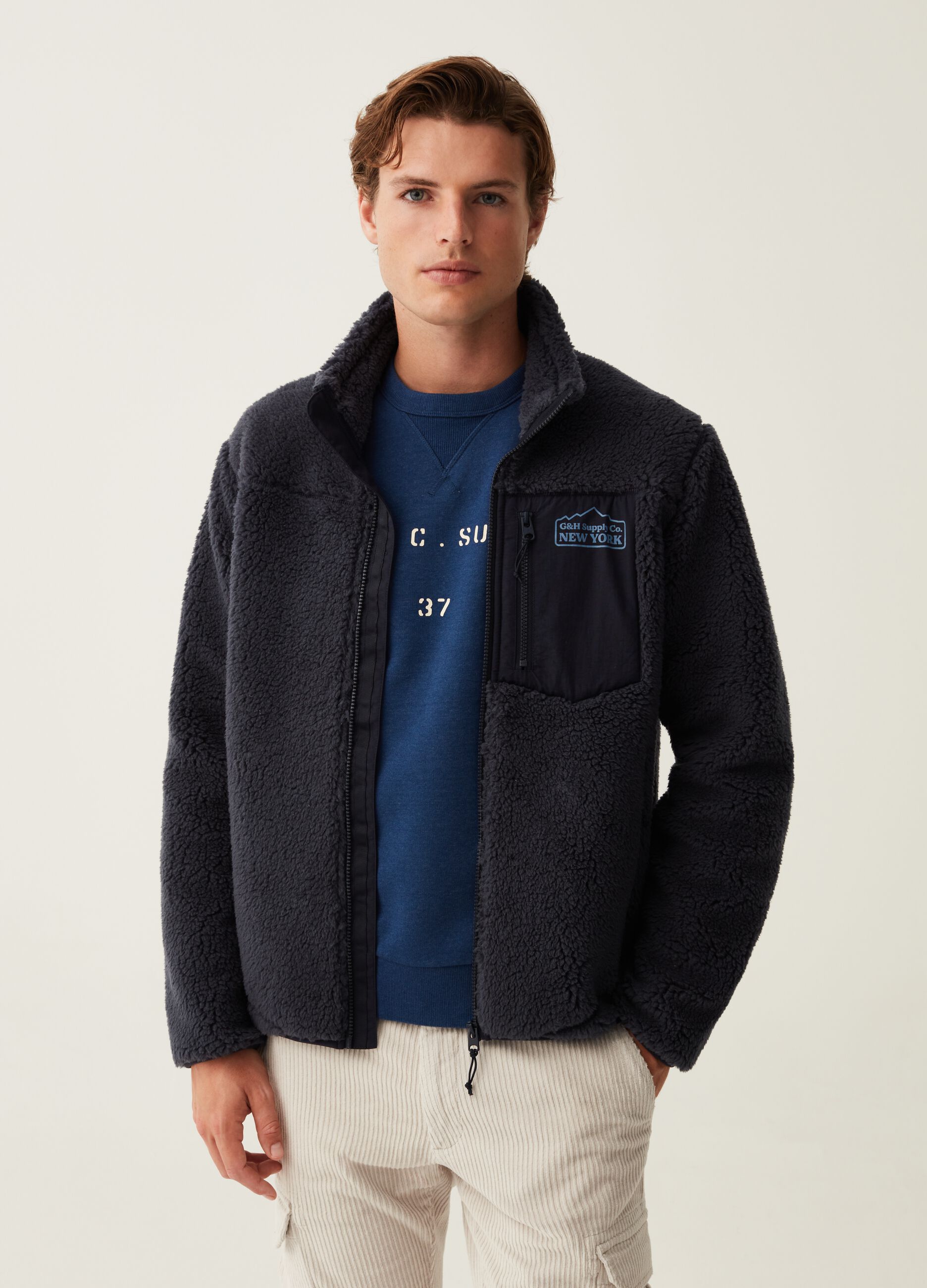 Full-zip in sherpa con tasche_0