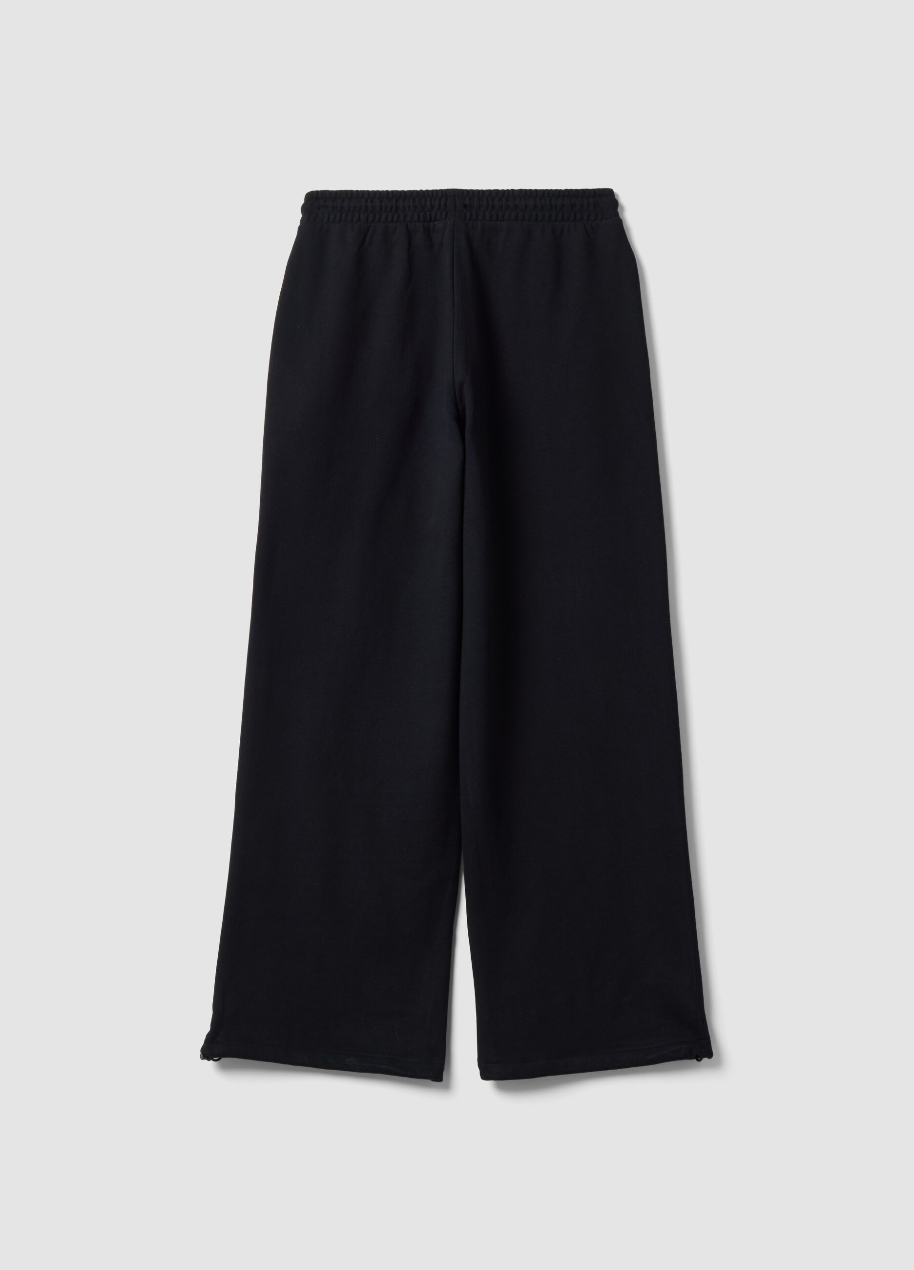 Black pure cotton joggers with elasticated waistband, oversized fit
