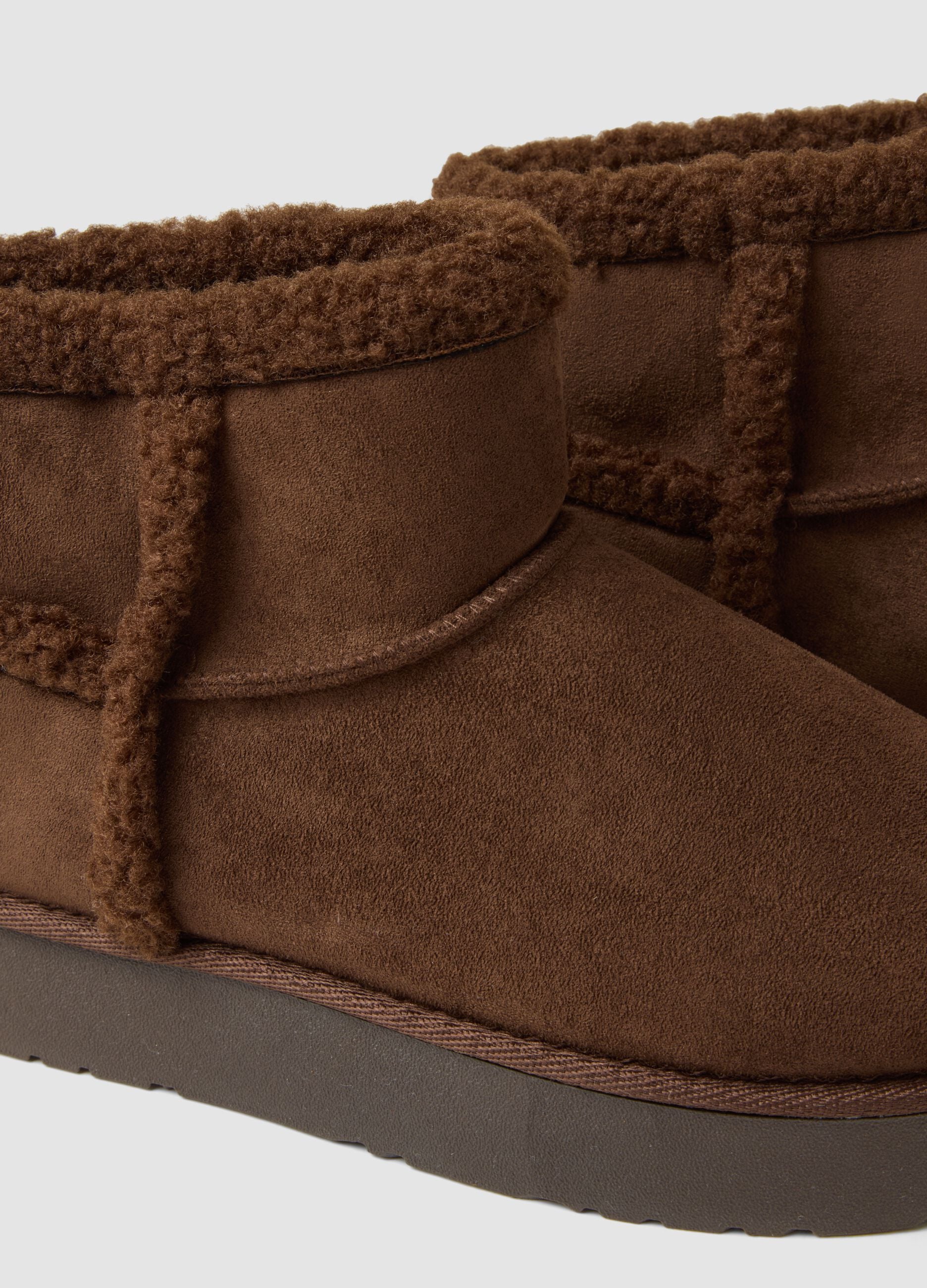Brown ankle boots with trim