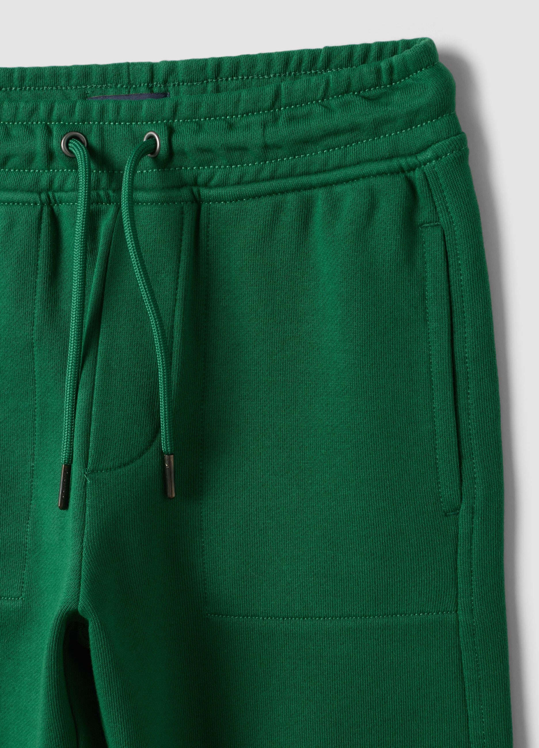 Pantaloni jogger verdi in puro cotone con vita elasticizzata per bambino
