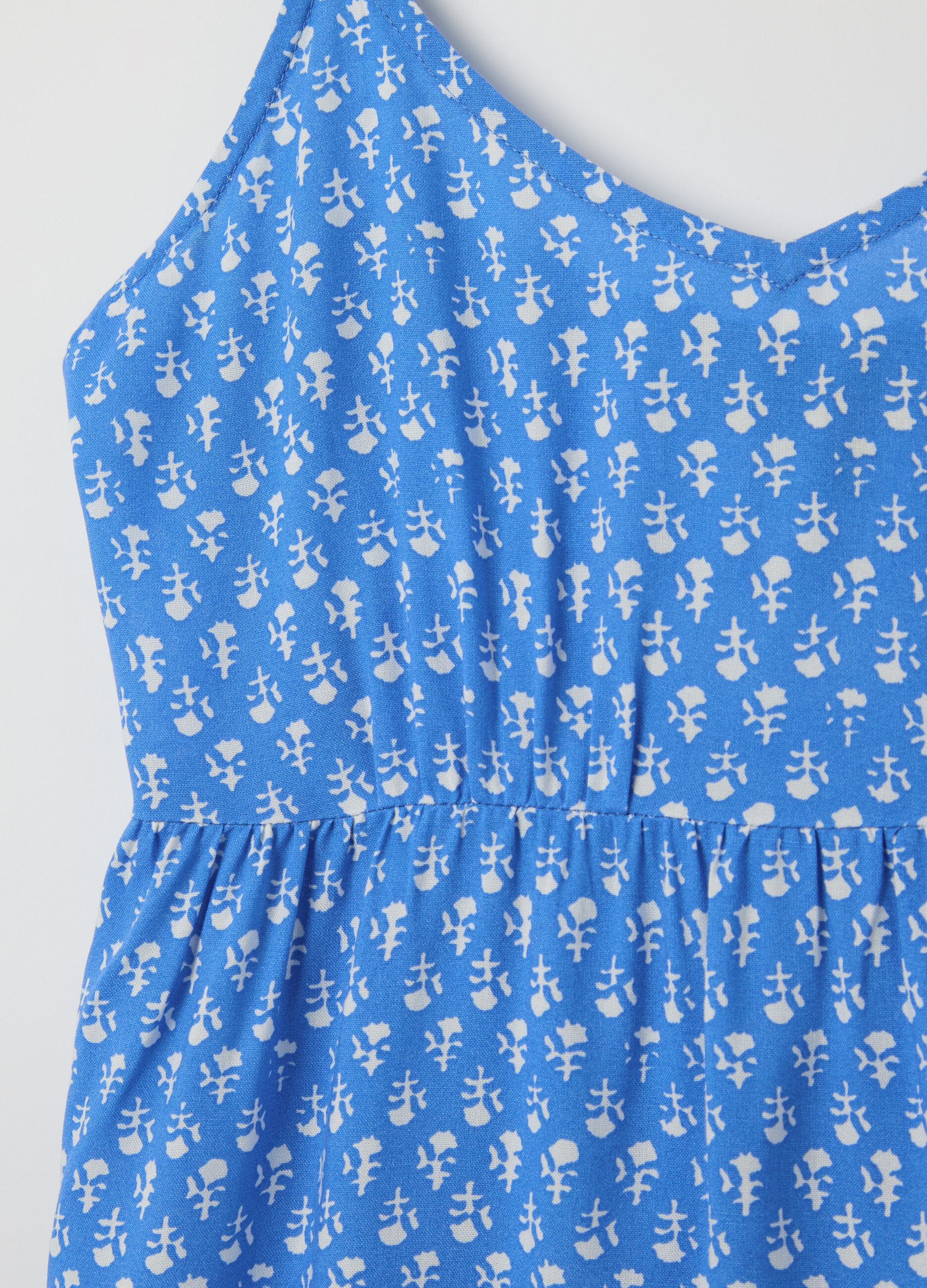 Light blue viscose dress with V neck and flounce