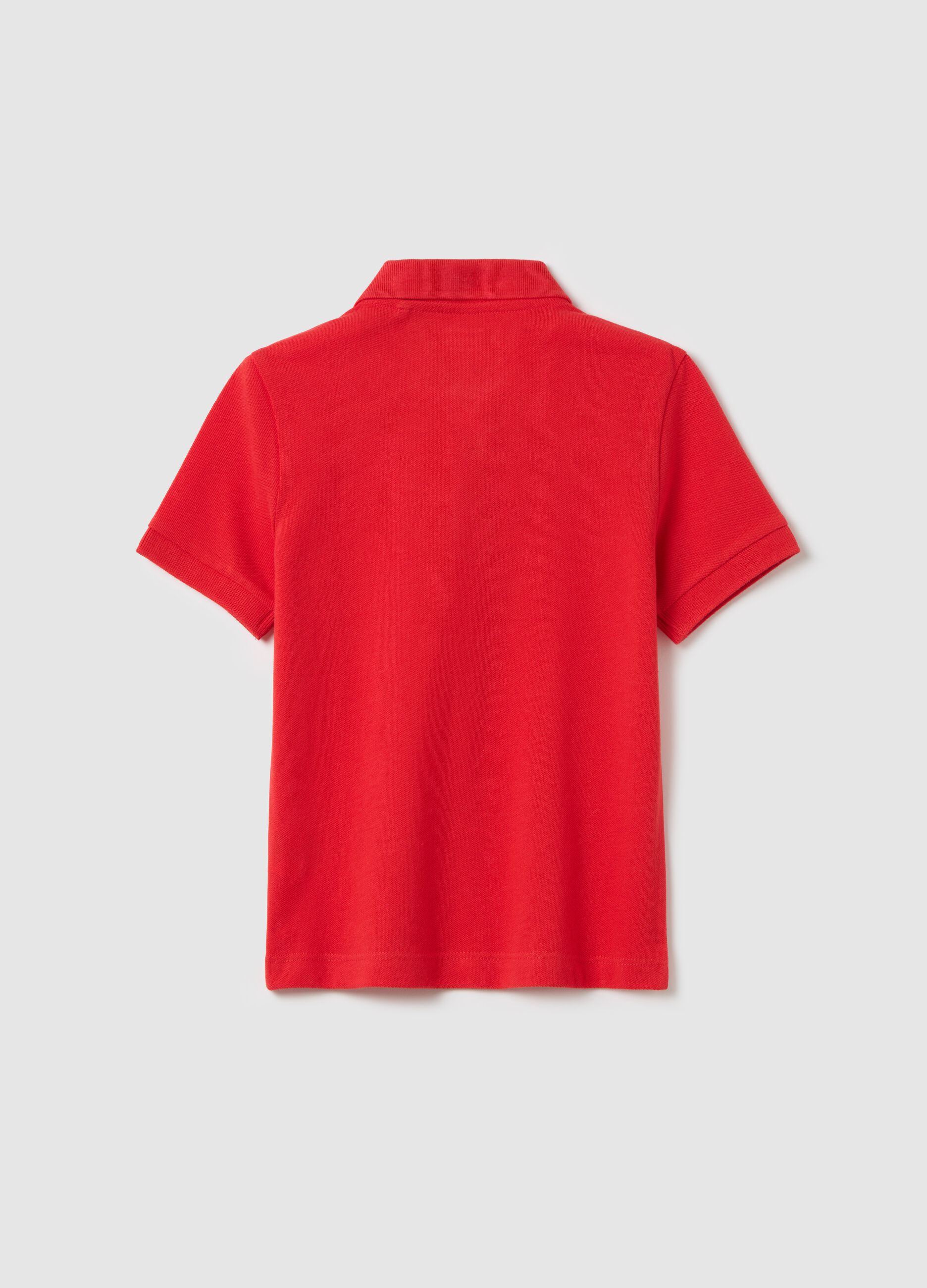Red polo shirt with short sleeves in organic cotton