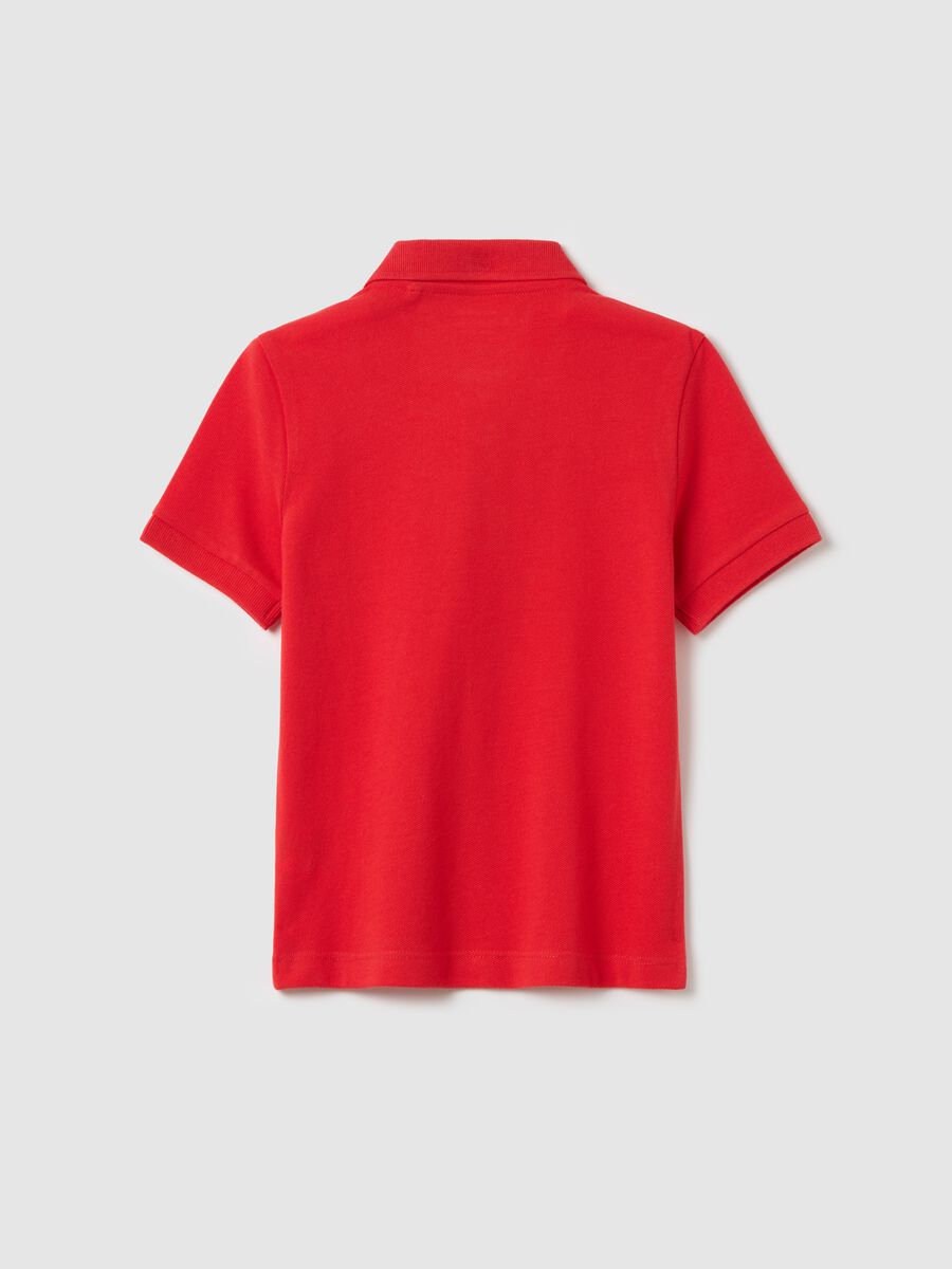 Red polo shirt with short sleeves in organic cotton_1