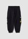 Black pure cotton cargo jogger trousers with appliqu&eacute; for boys_1