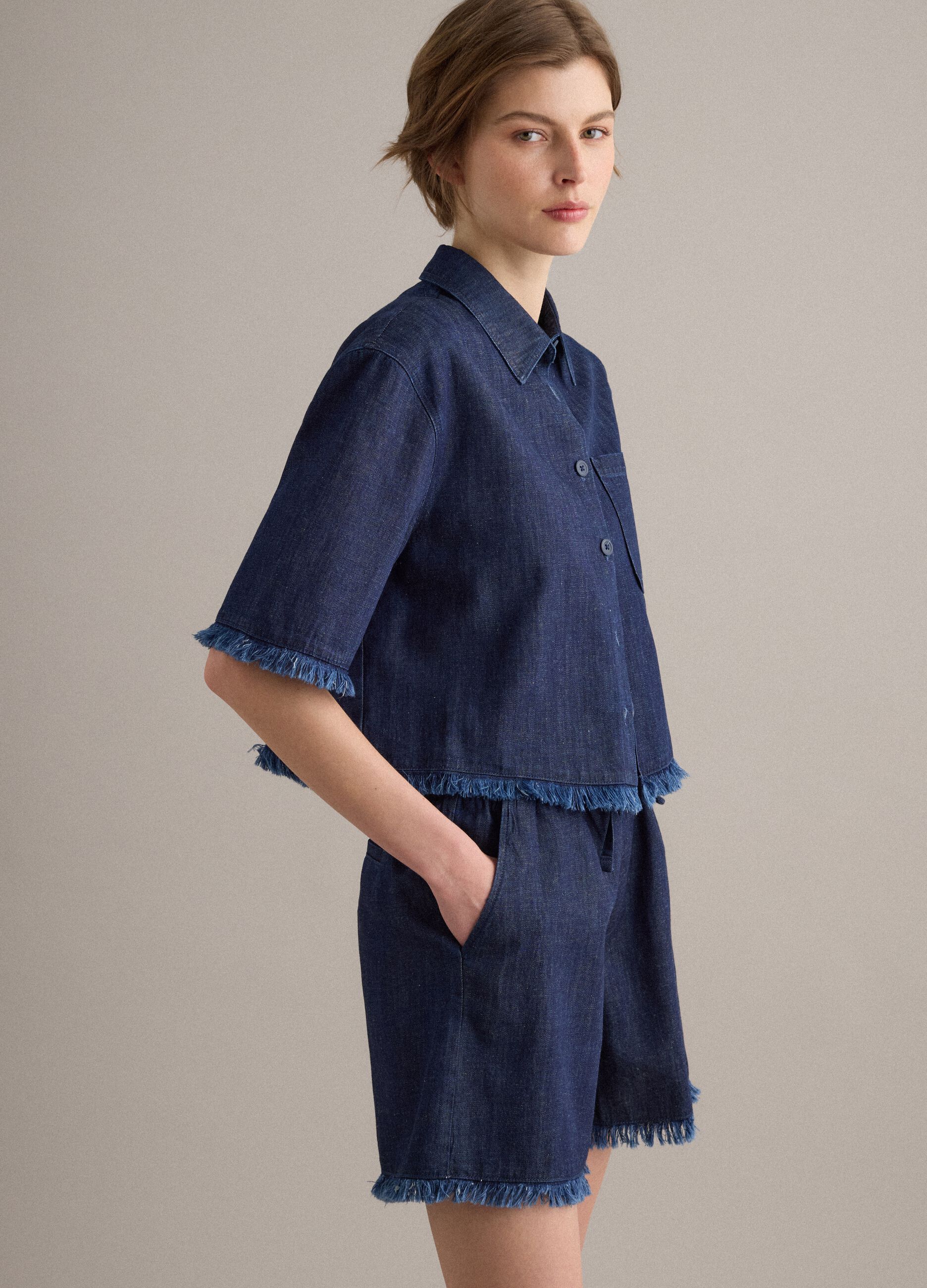 Blue denim shirt in cotton blend, oversized fit with frayed hem