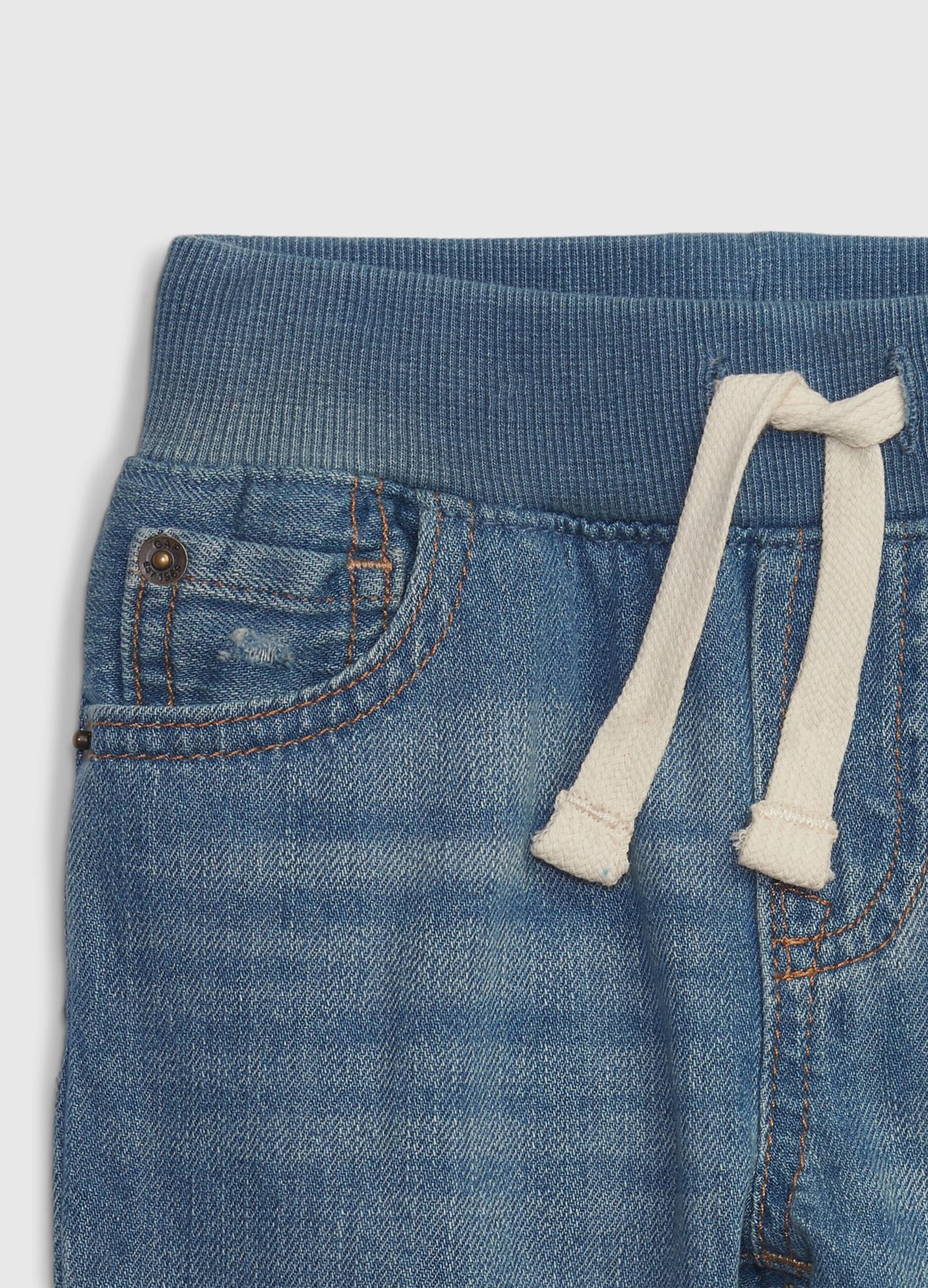 Denim joggers with abrasions