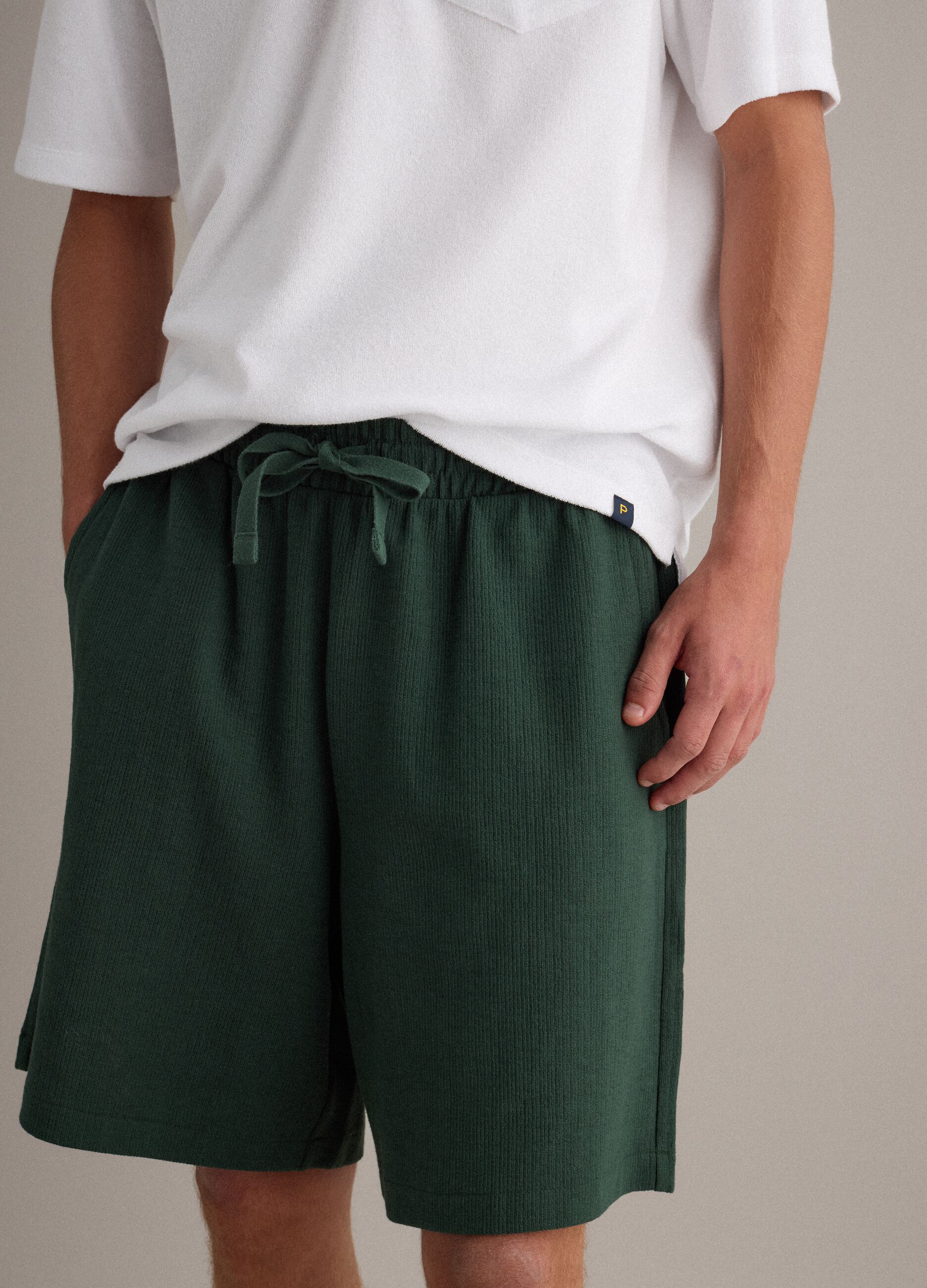 Green cotton-blend jogger shorts with drawstring, relaxed fit
