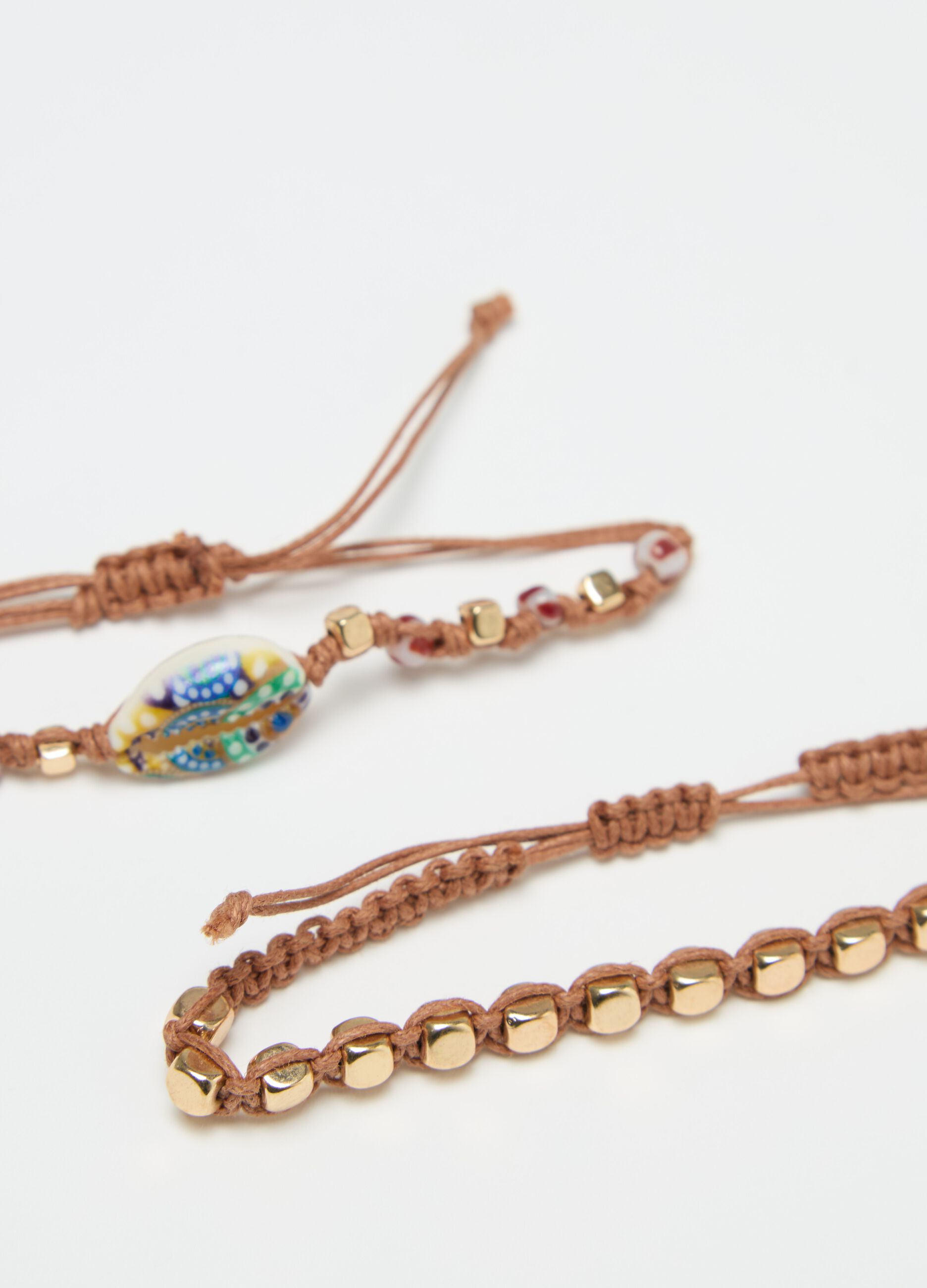 Set quattro bracciali perline e conchiglie