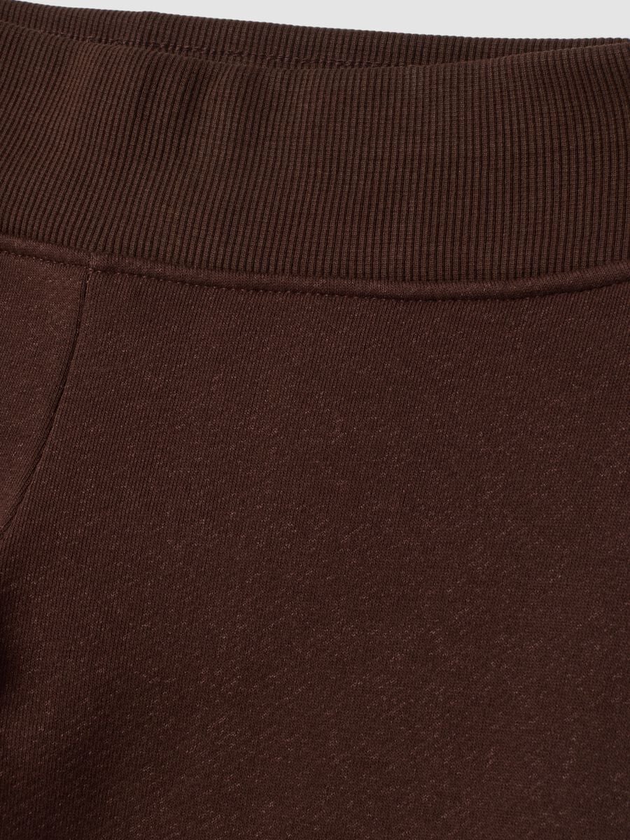 Brown flared stretch-cotton trousers_1