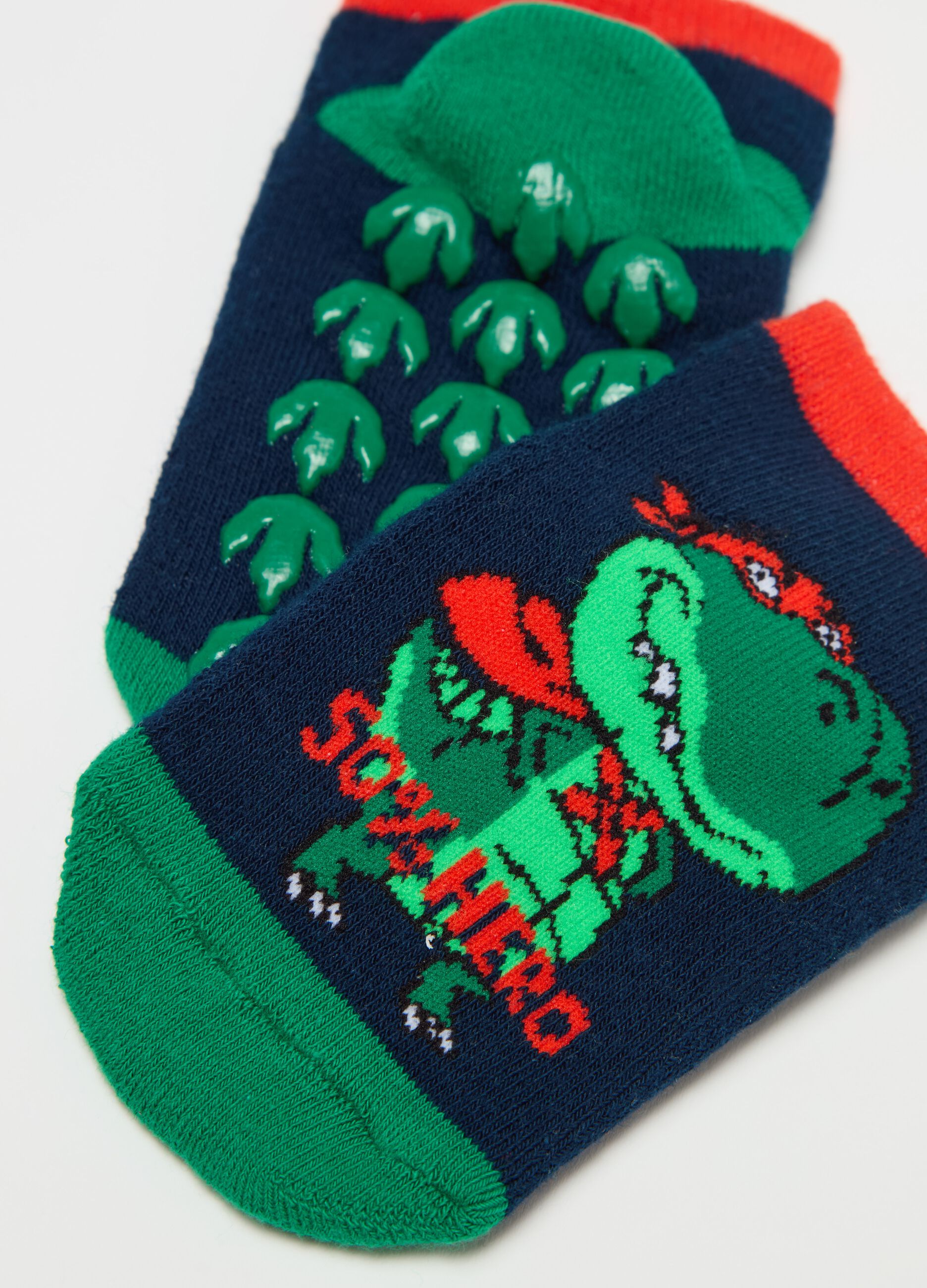 Slipper socks with dinosaur design