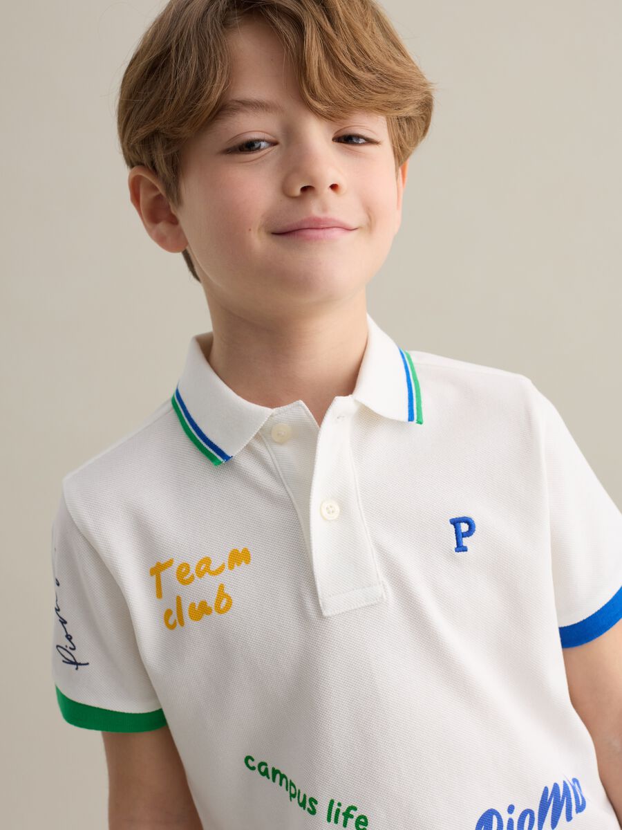 Piquet polo shirt with lettering print and logo embroidery_1