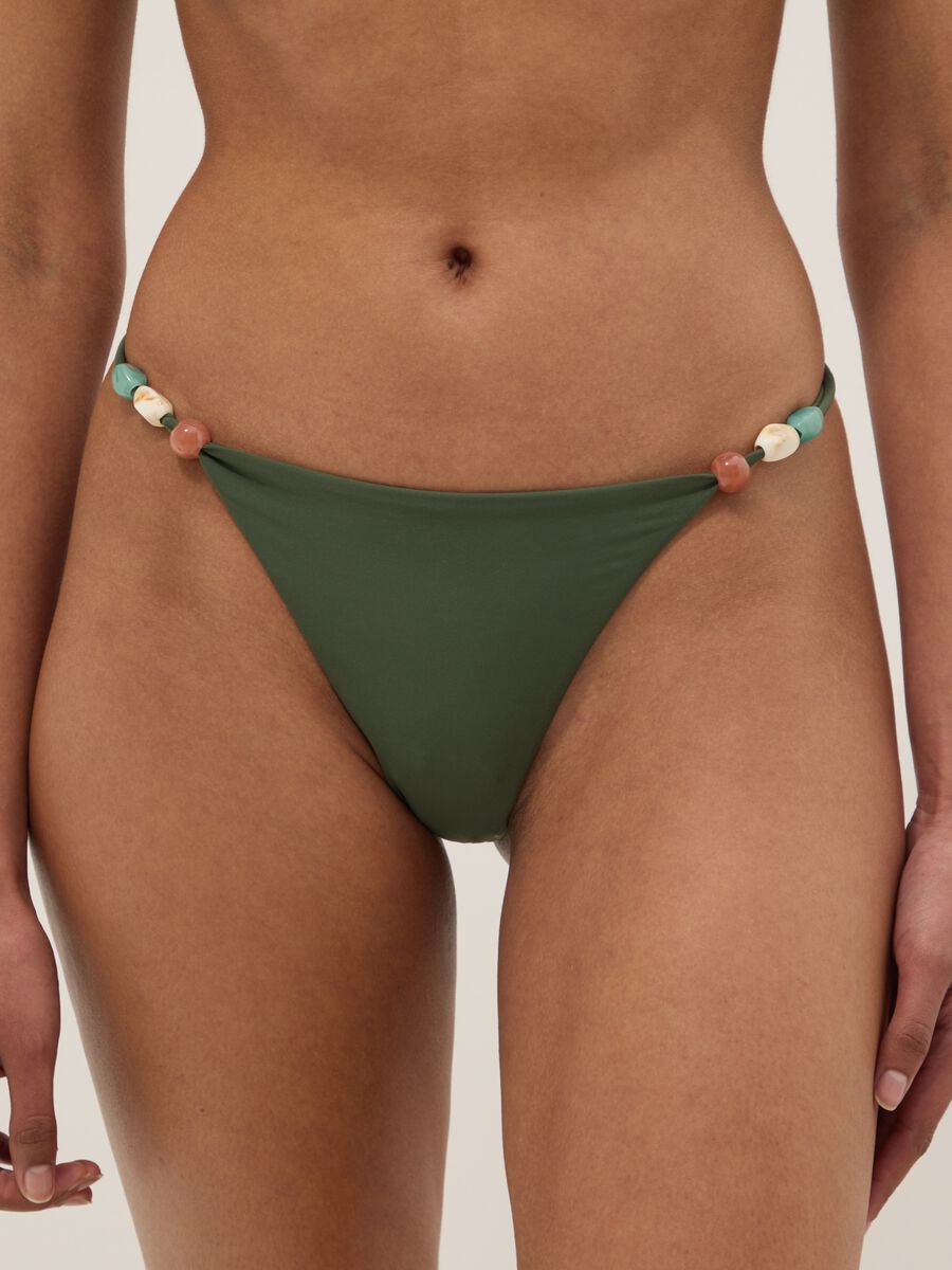 Green Brazilian-style stretch bikini bottoms with side stones_1