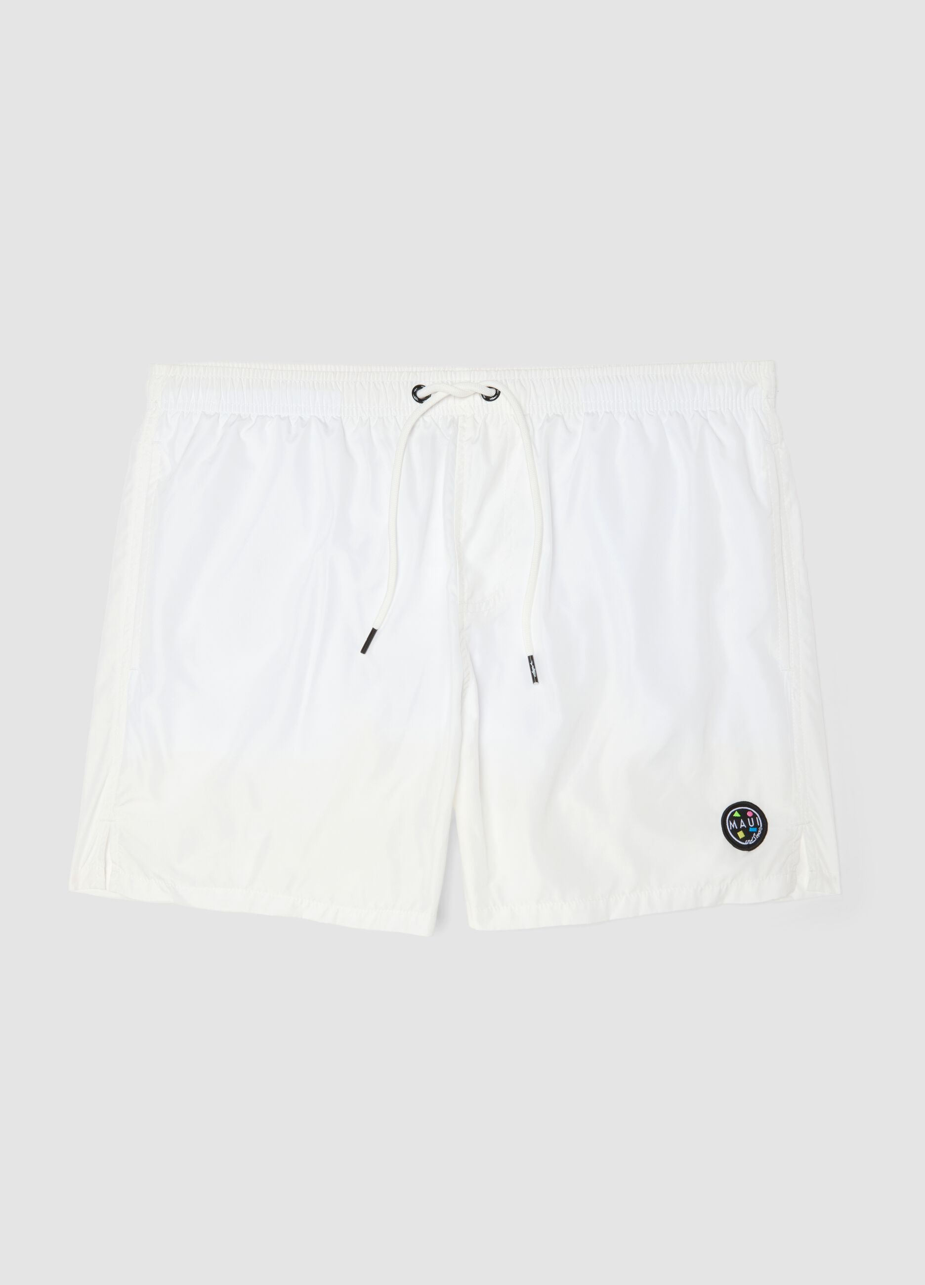 White swim shorts with elasticated waistband