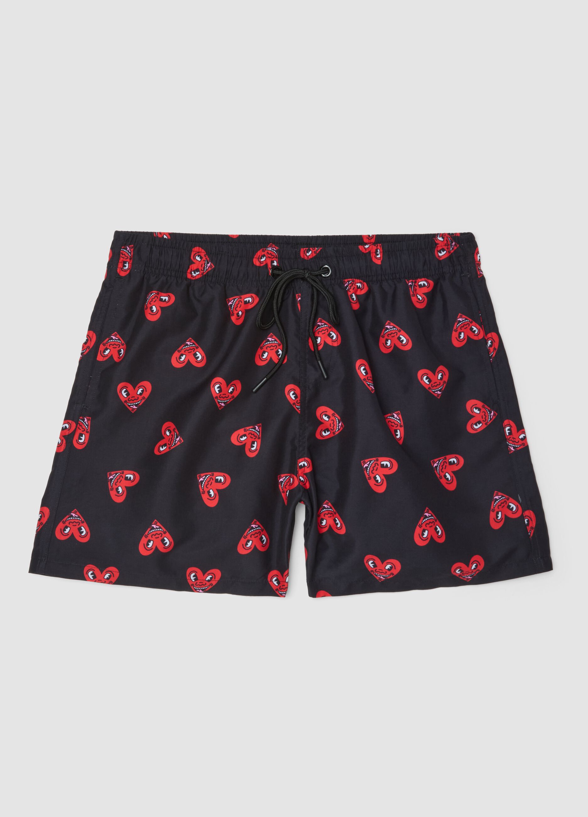 Black beach boxers with Keith Haring heart prints