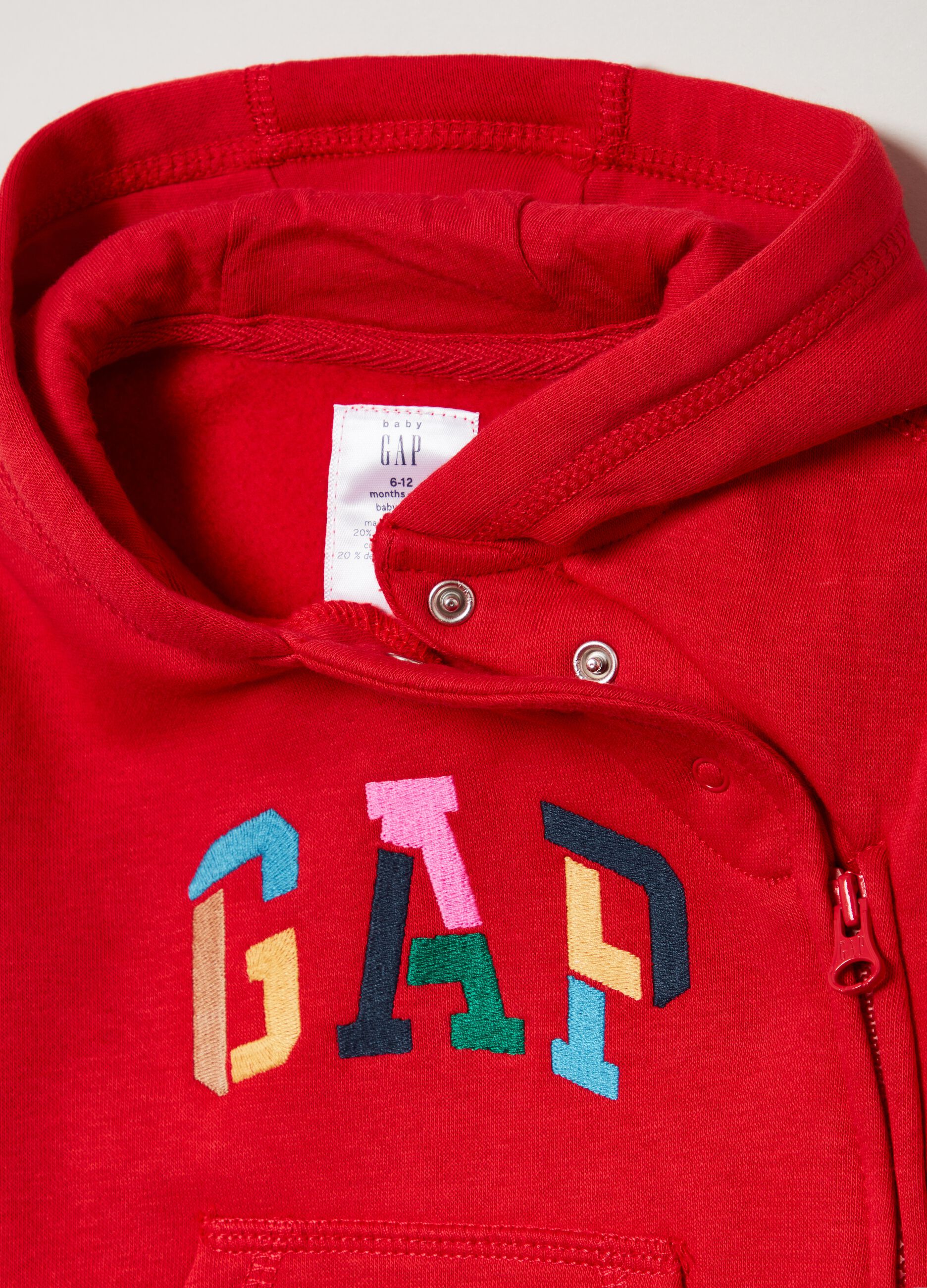Onesie with hood and embroidered logo
