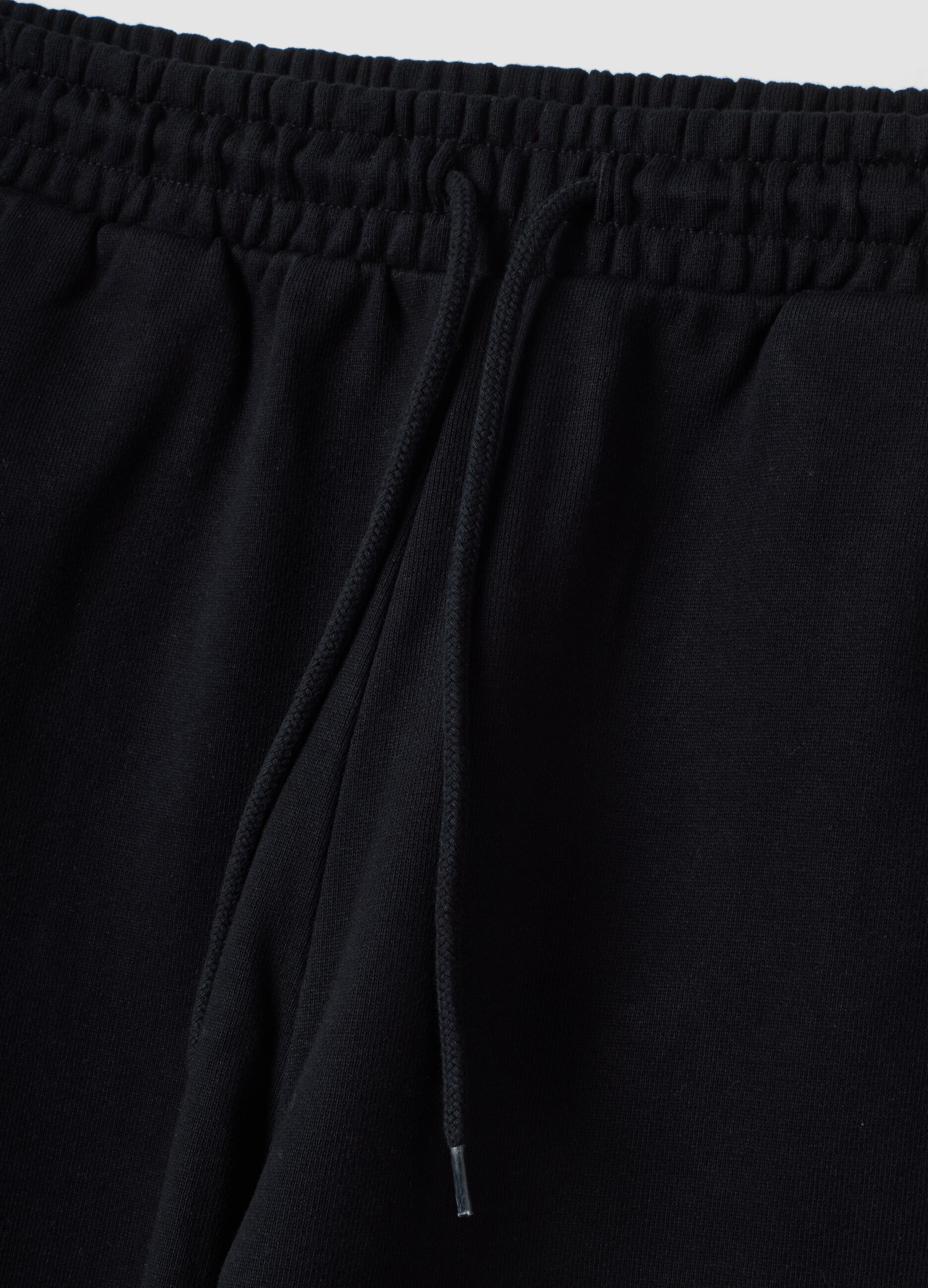 Black pure cotton joggers with elasticated waistband, oversized fit