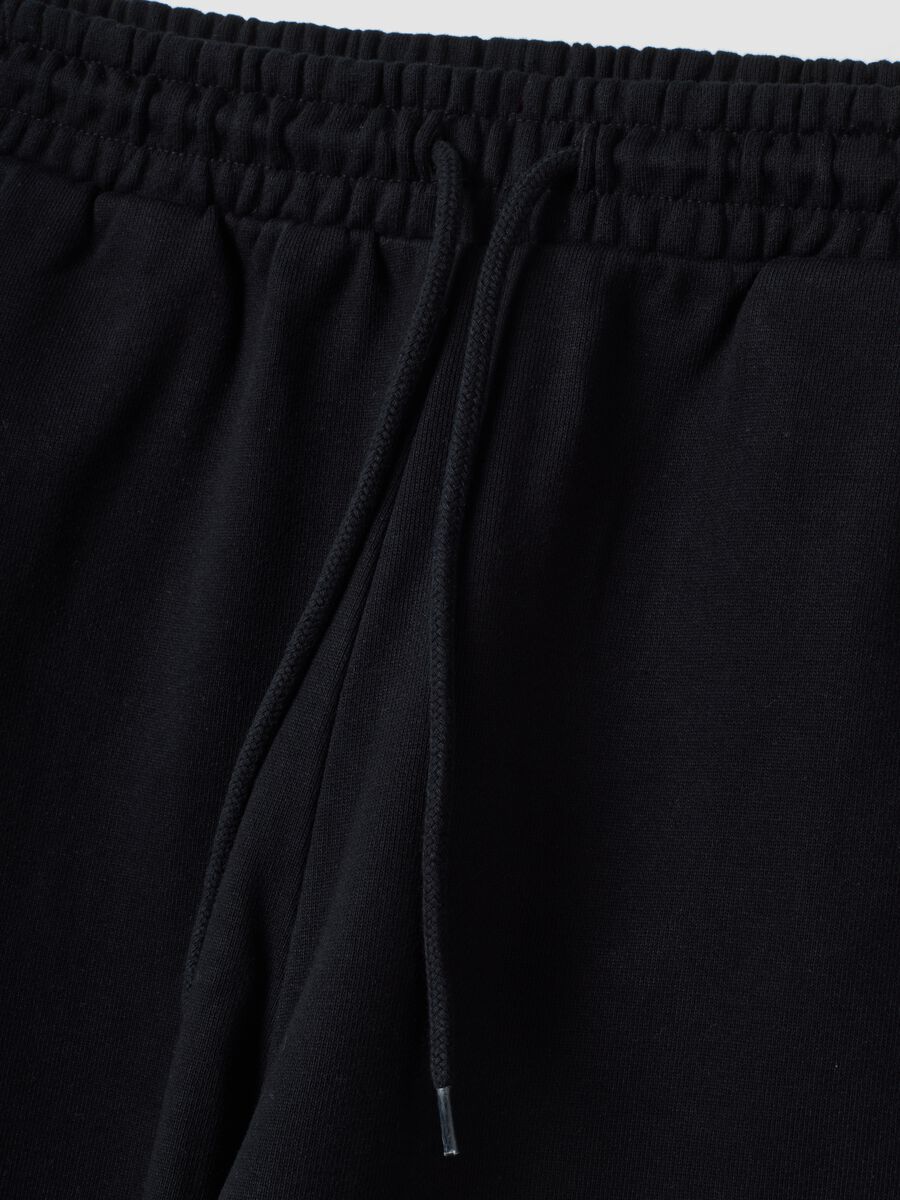 Black pure cotton joggers with elasticated waistband, oversized fit_1