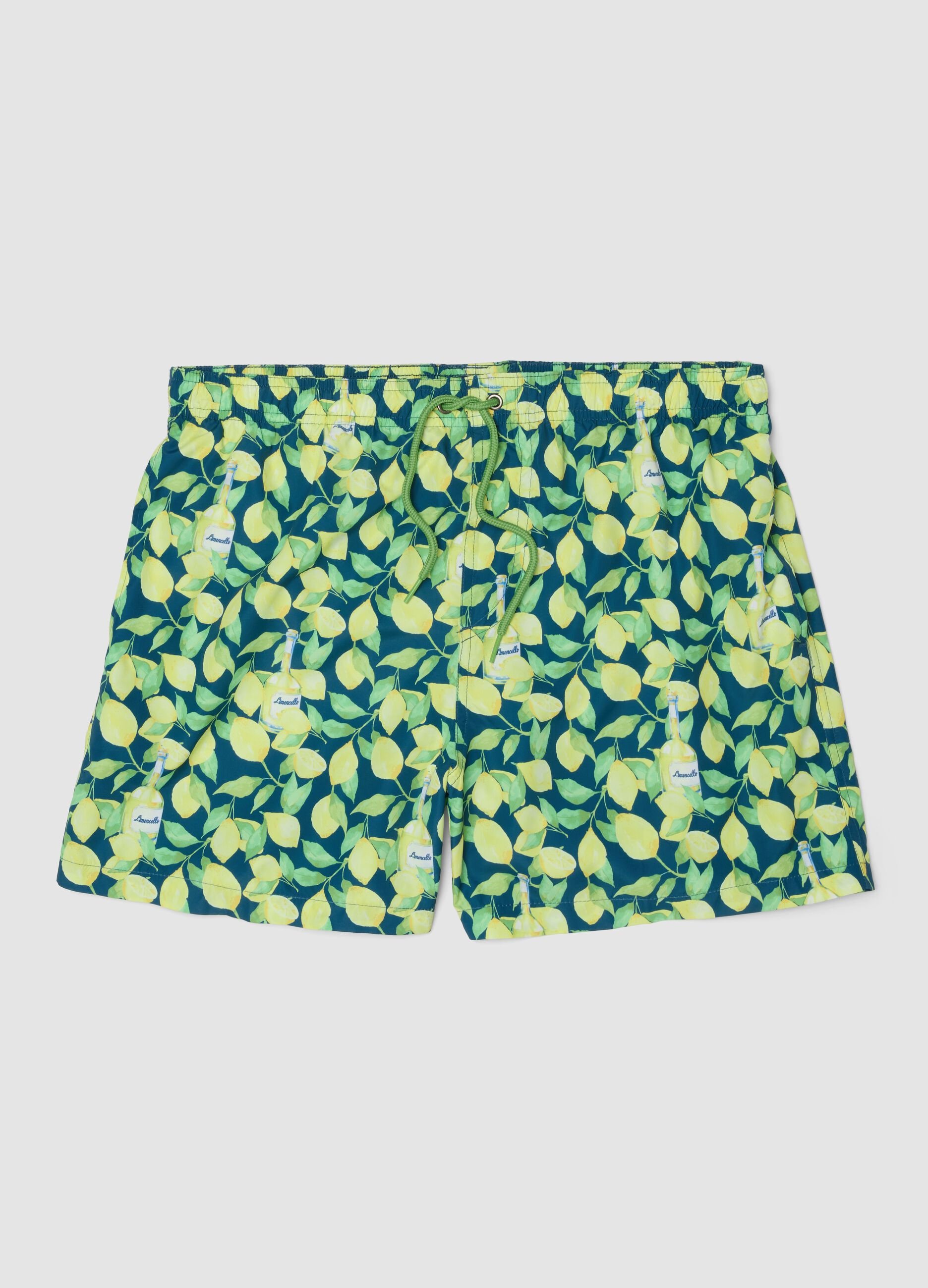 Blue boxer swim shorts with Limoncello print