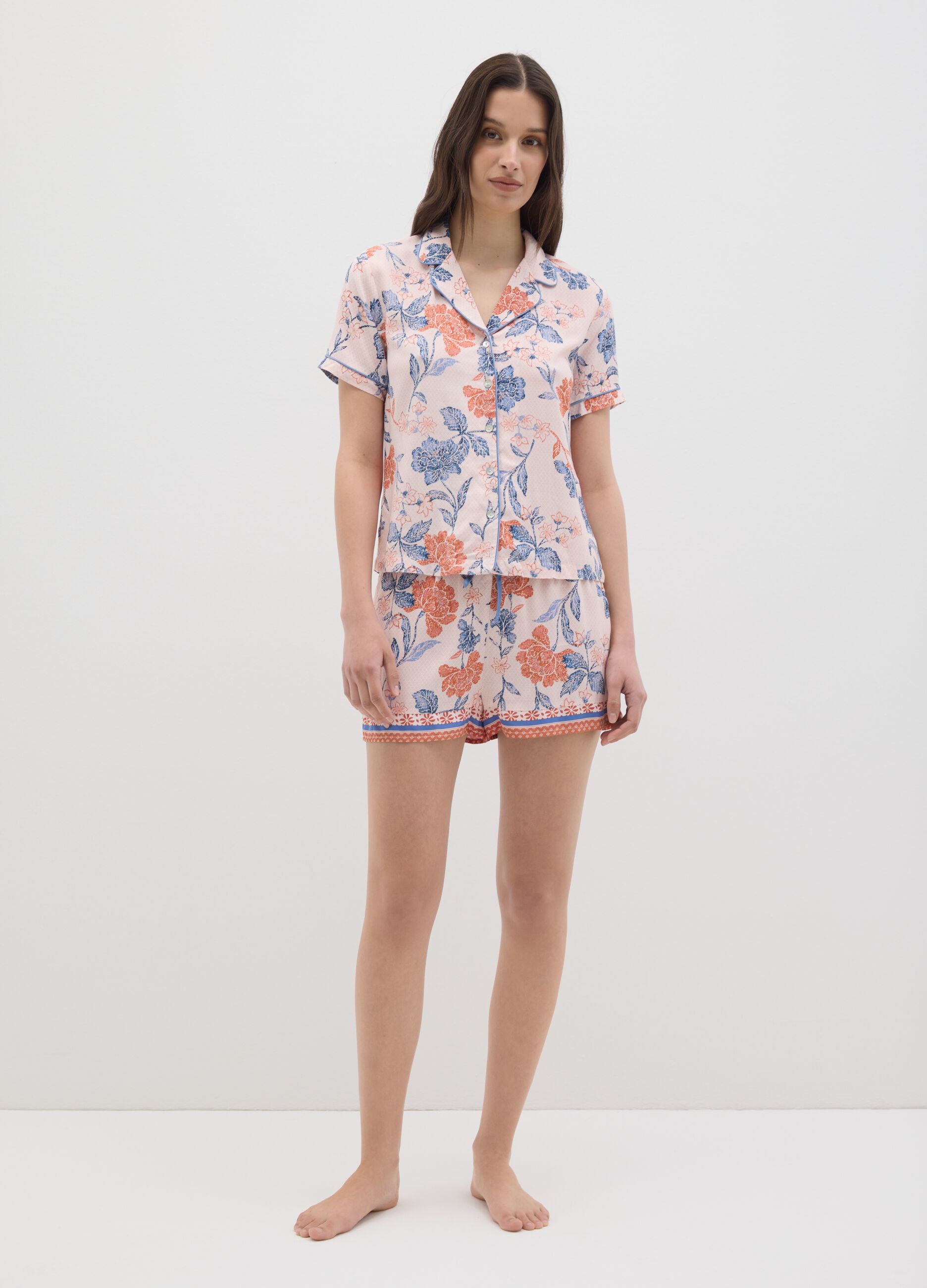 Short orange pyjamas with floral print
