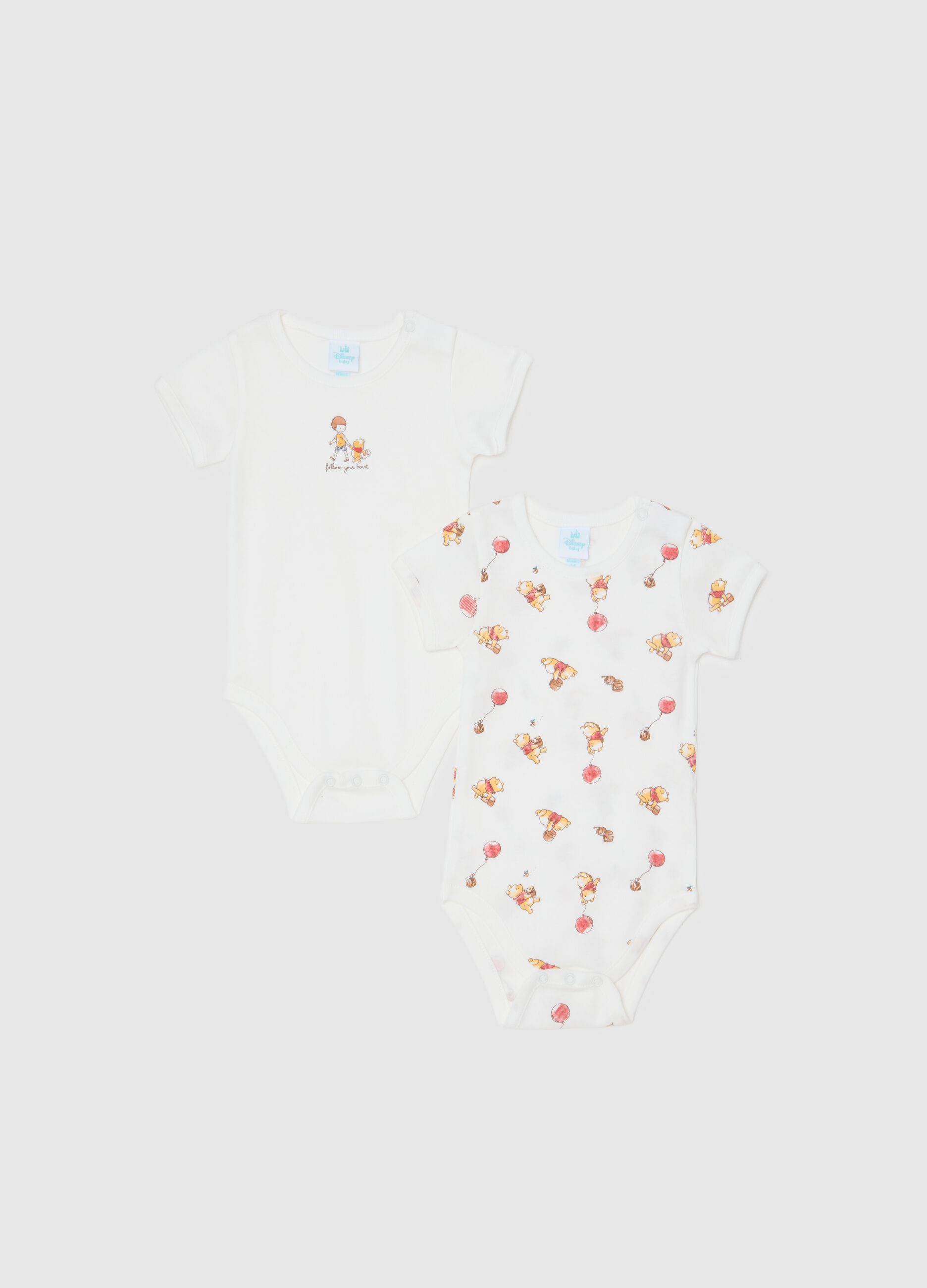 Set of two white newborn bodysuits in pure cotton