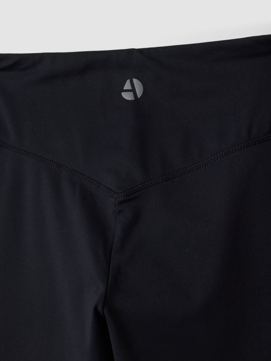 Blue flared leggings in stretchy fabric_9