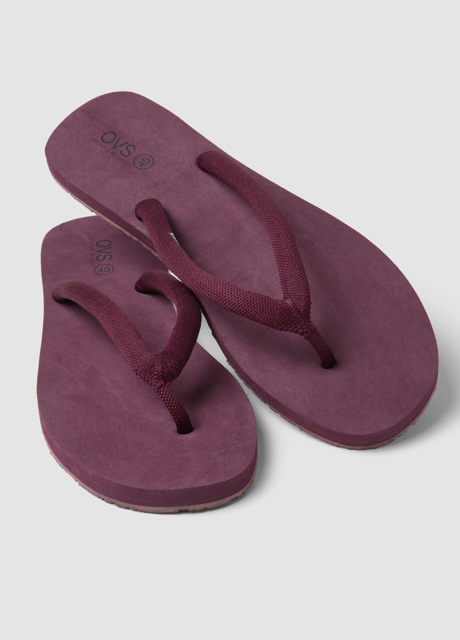 Purple flip-flops with thick straps