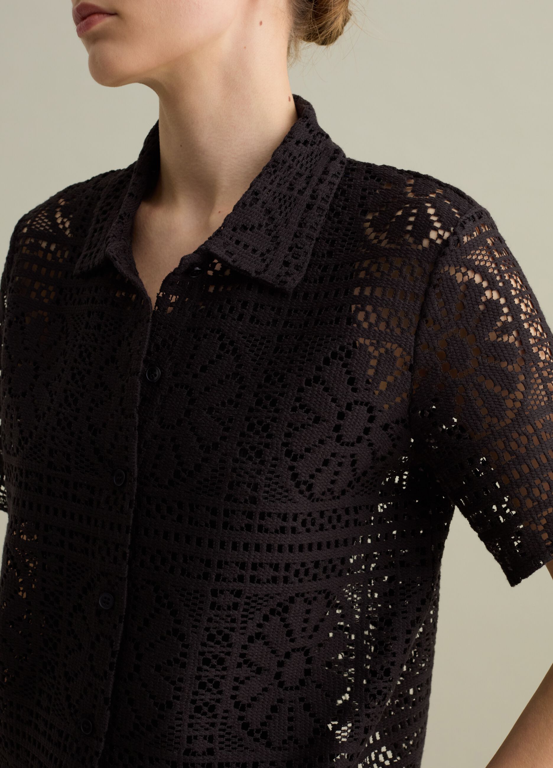 Black polo shirt in lace