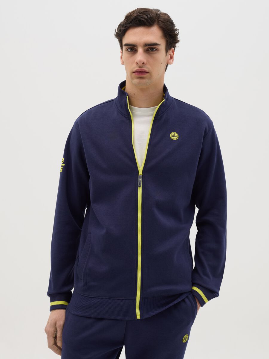 Blue full-zip sweatshirt with yellow details and logo_0