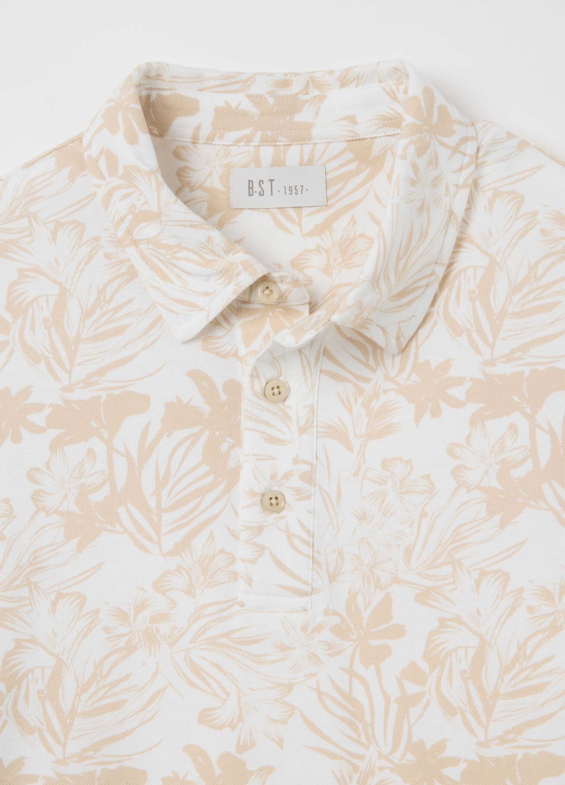 Polo a maniche corte beige con stampa floreale BST