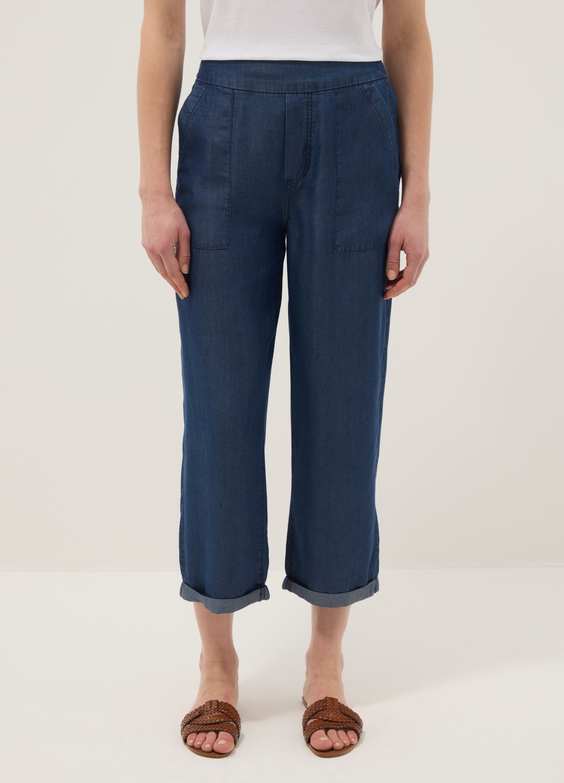 Blue denim jeans in 100% lyocell with elasticated waist, relaxed fit