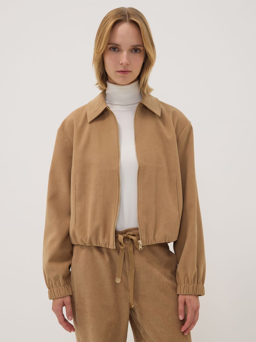 Blazer beige in tessuto elasticizzato con zip over fit_0
