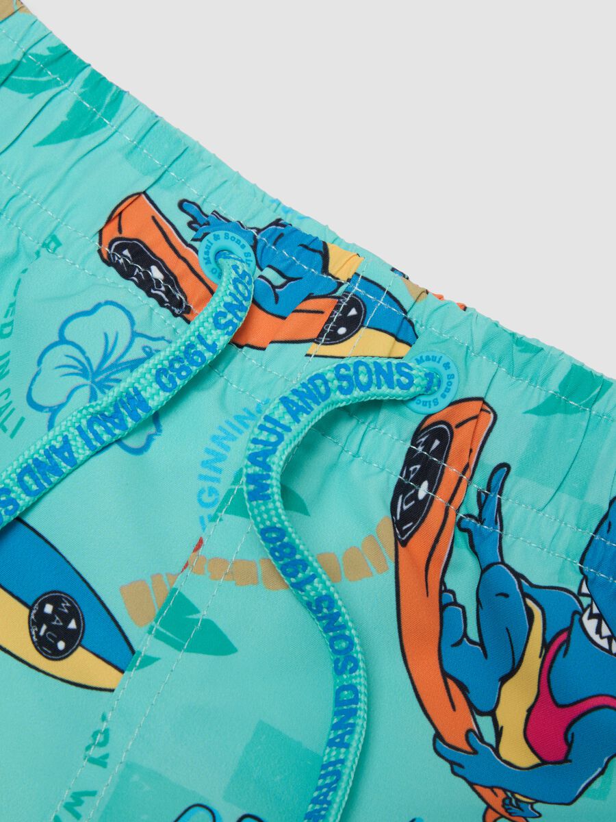 Blue boys&rsquo; swim shorts with tropical print_3