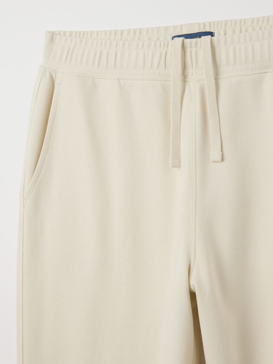 Beige pure cotton trousers with oversized fit_1