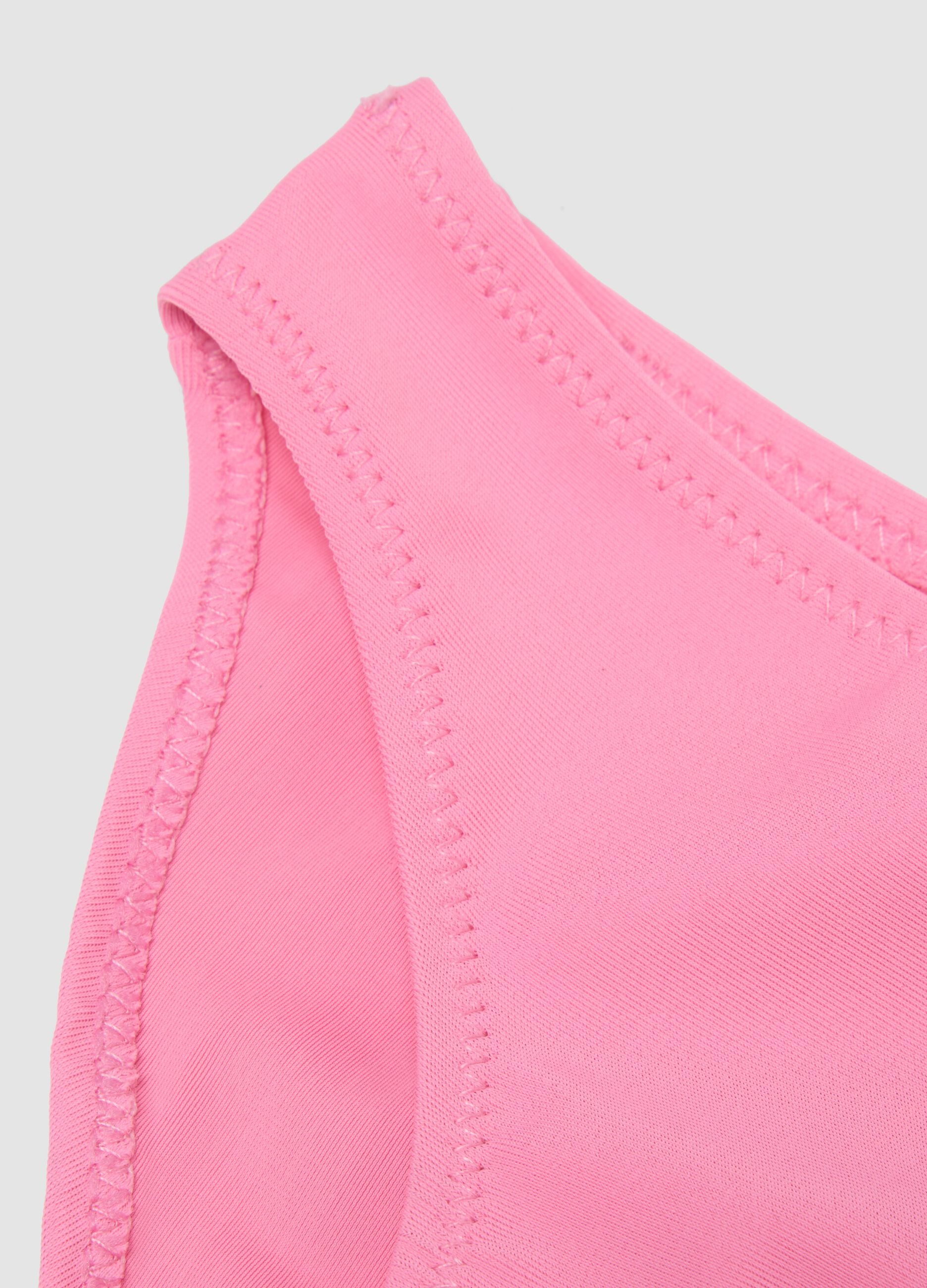 Pink triangle bikini in stretch fabric with frills