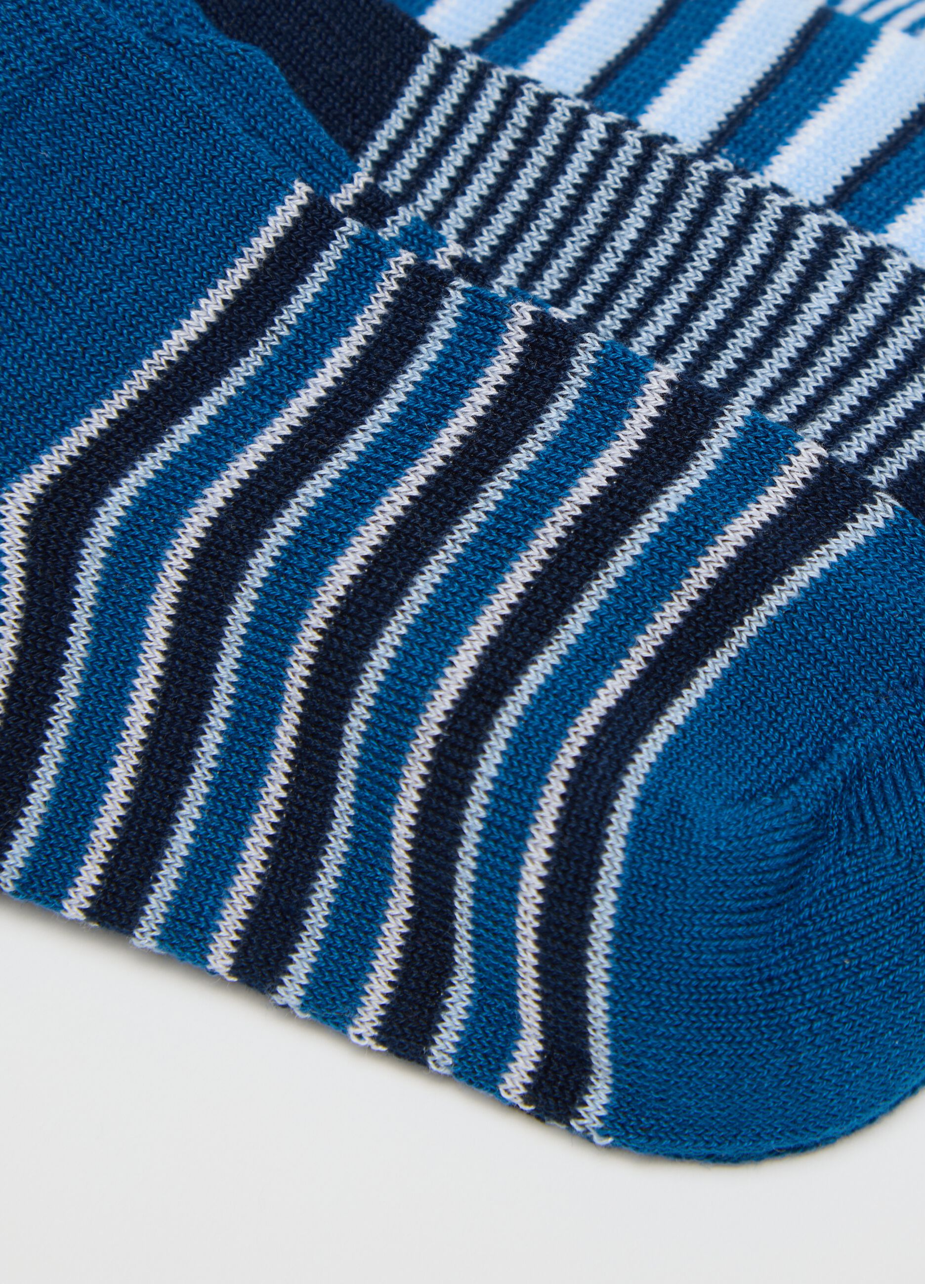 Seven-pair pack white and blue shoe liners with stripes